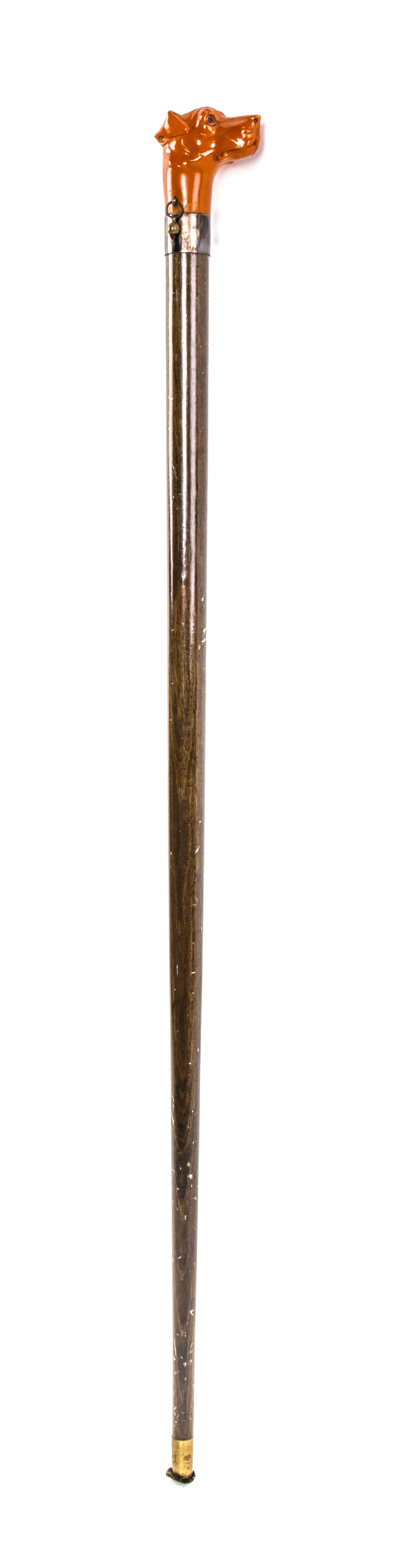An American Plastic Handled Cane, Length of handle 2 1/4 x length overall 33 1/2 inches.