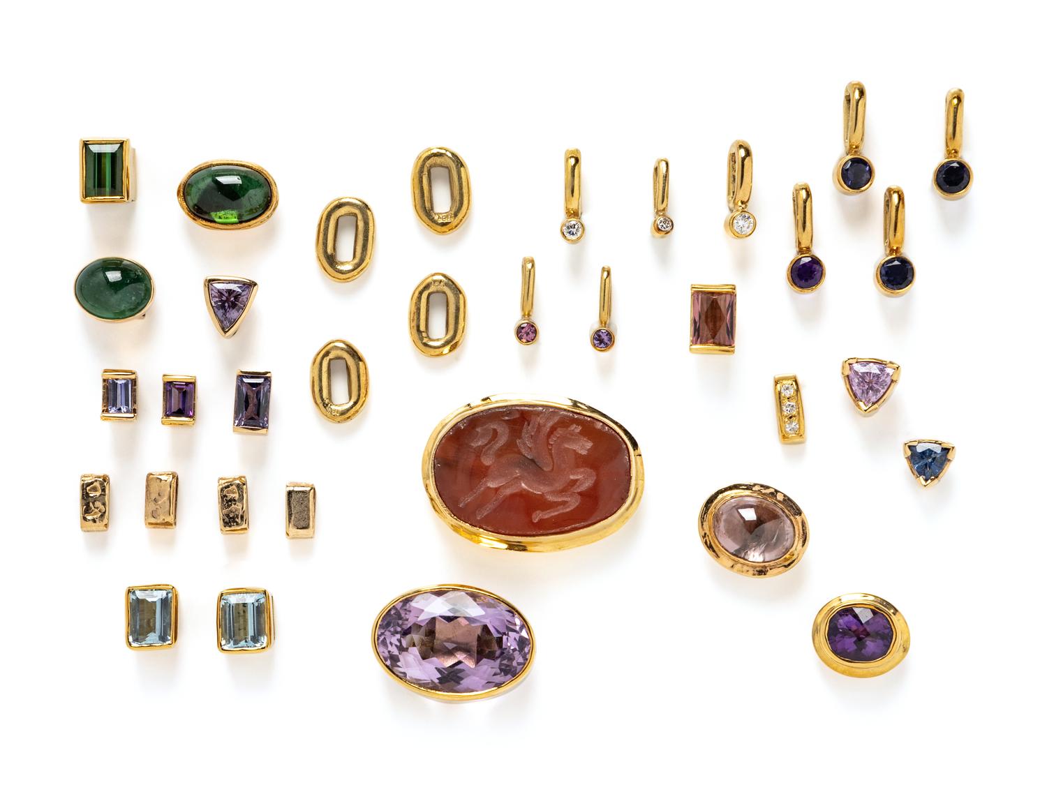 COLLECTION OF BEZEL SET MULTIGEM SLIDES AND SPACERS
