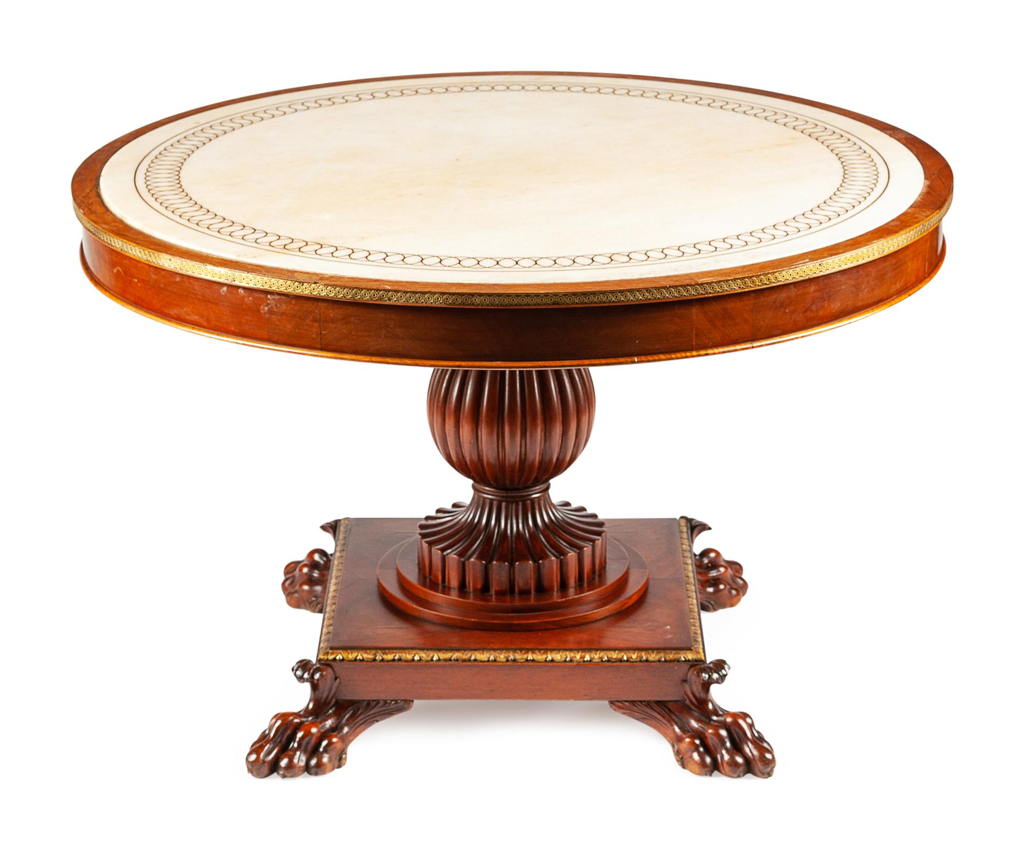 A Louis Philippe Parcel Gilt Mahogany Center Table