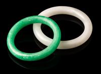 Two Jadeite Bangles Diameter of larger 3 3/8 inches.
