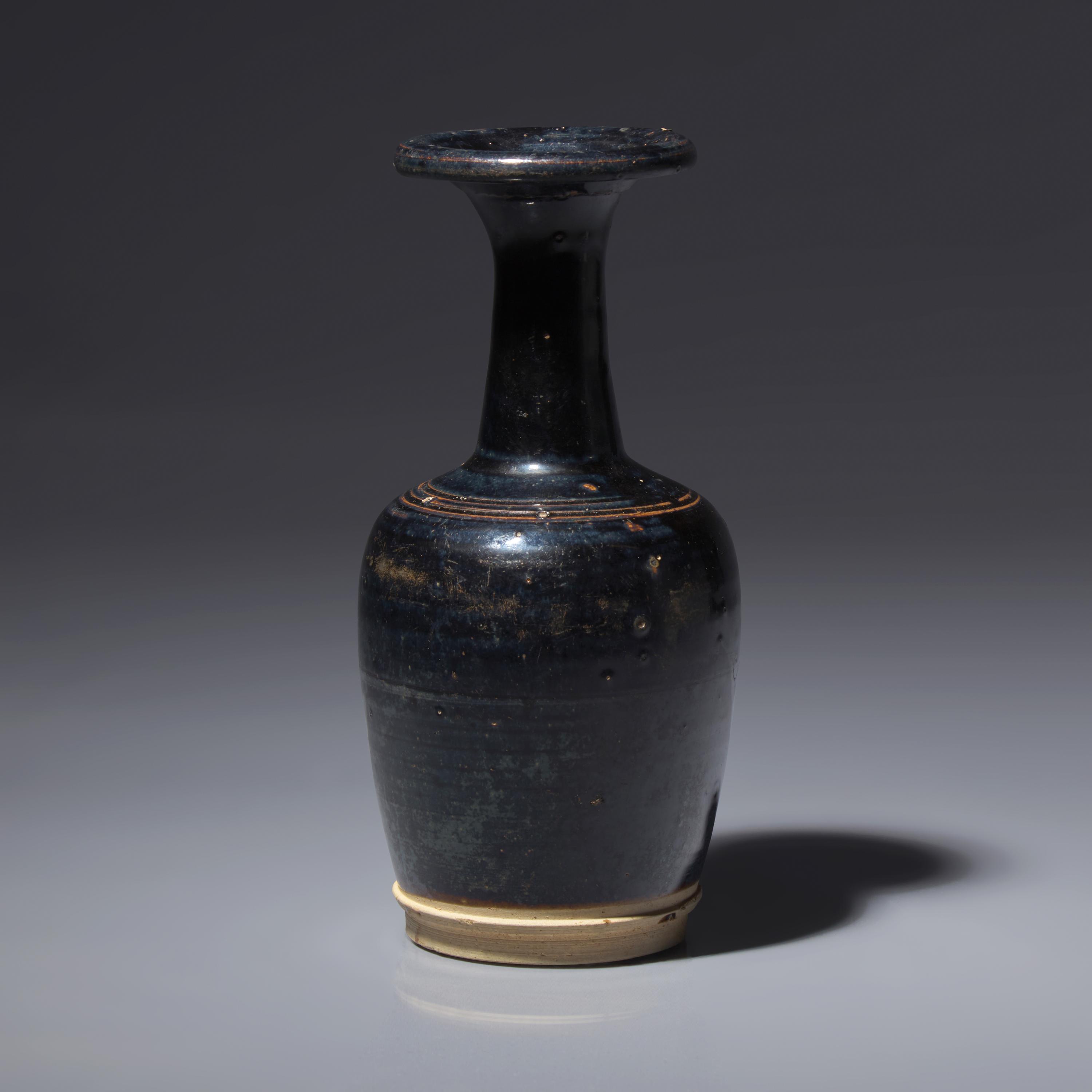 A Chinese Black Glazed Mallet-Form Vase, Song-Yuan Dynasty — 宋-元 黑釉小紙槌瓶