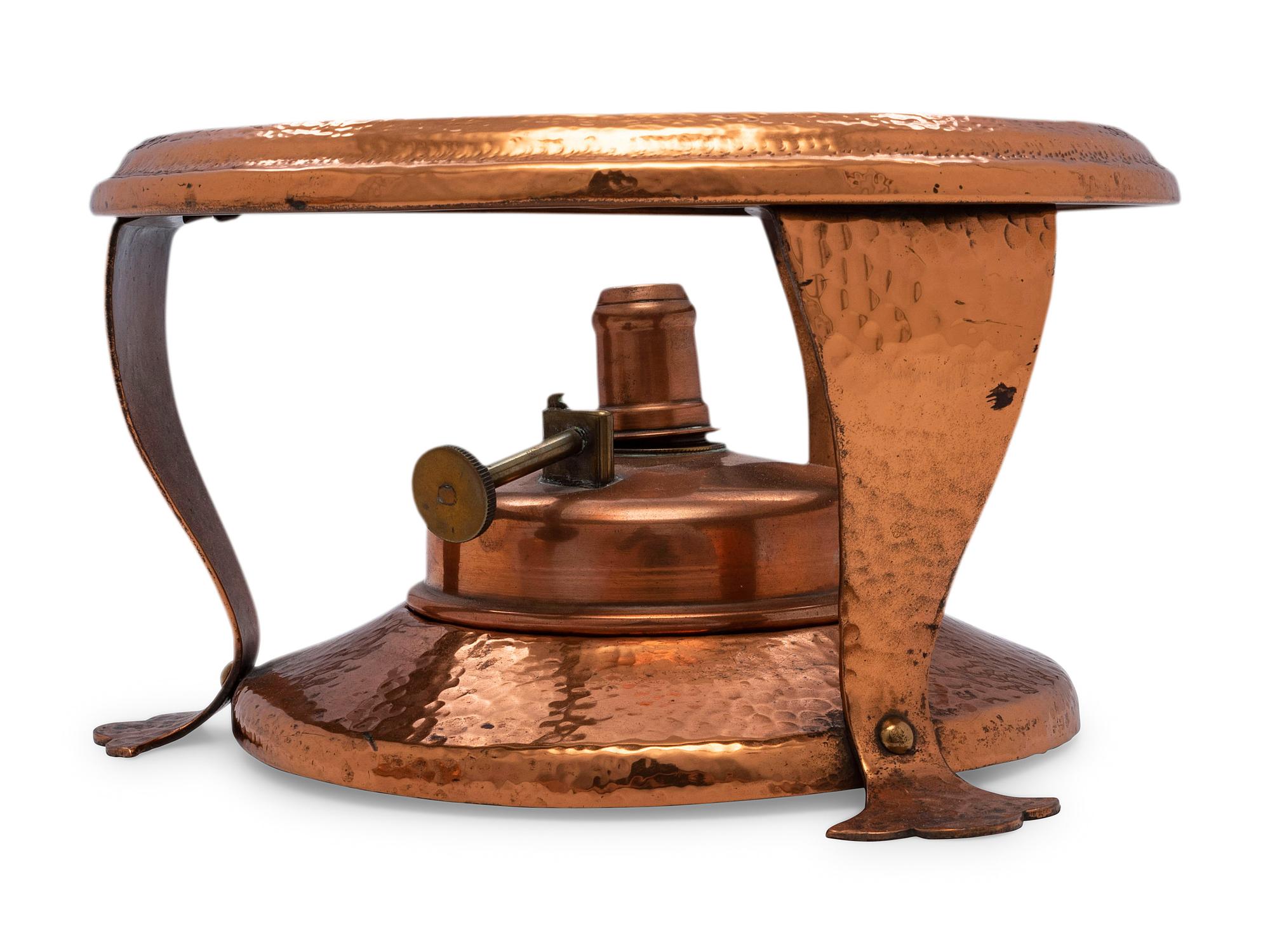 An American Hammered Copper Kettle on Stand