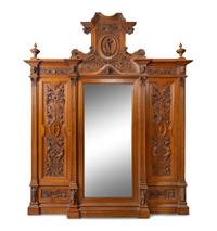 An Italian Renaissance Revival Carved Walnut Armoire