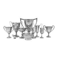 A Collection of Ten American and British Silver Presentation Trophies