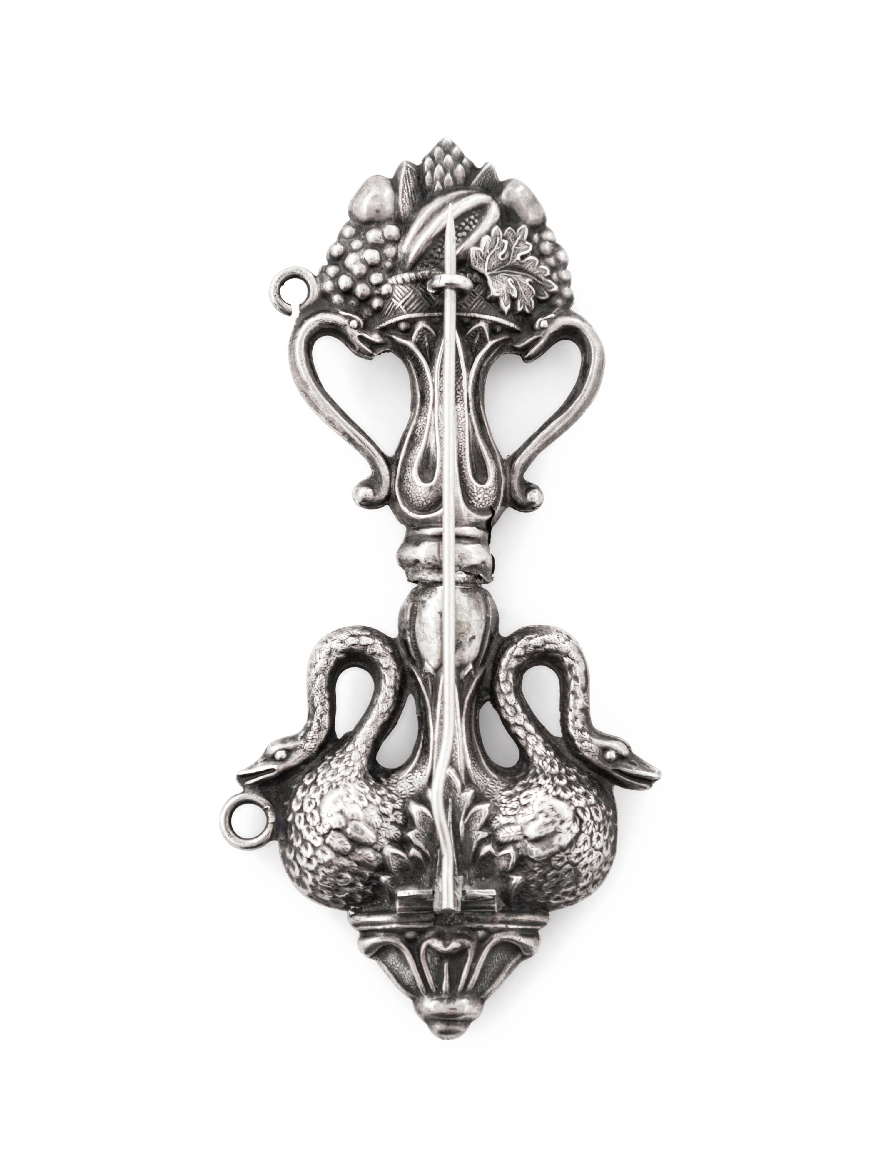 A Continental Garnet-Mounted Silver Needle Case