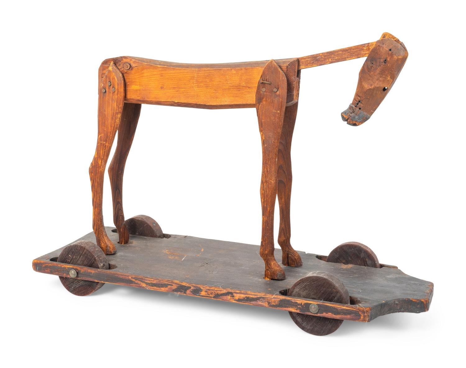 An American Folk Art Carved Pine Articulated Horse — 19TH CENTURY