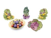A Collection of Eleven Assorted Ceramic Fruit and Vegetable Articles in the Style of Eva Gordon