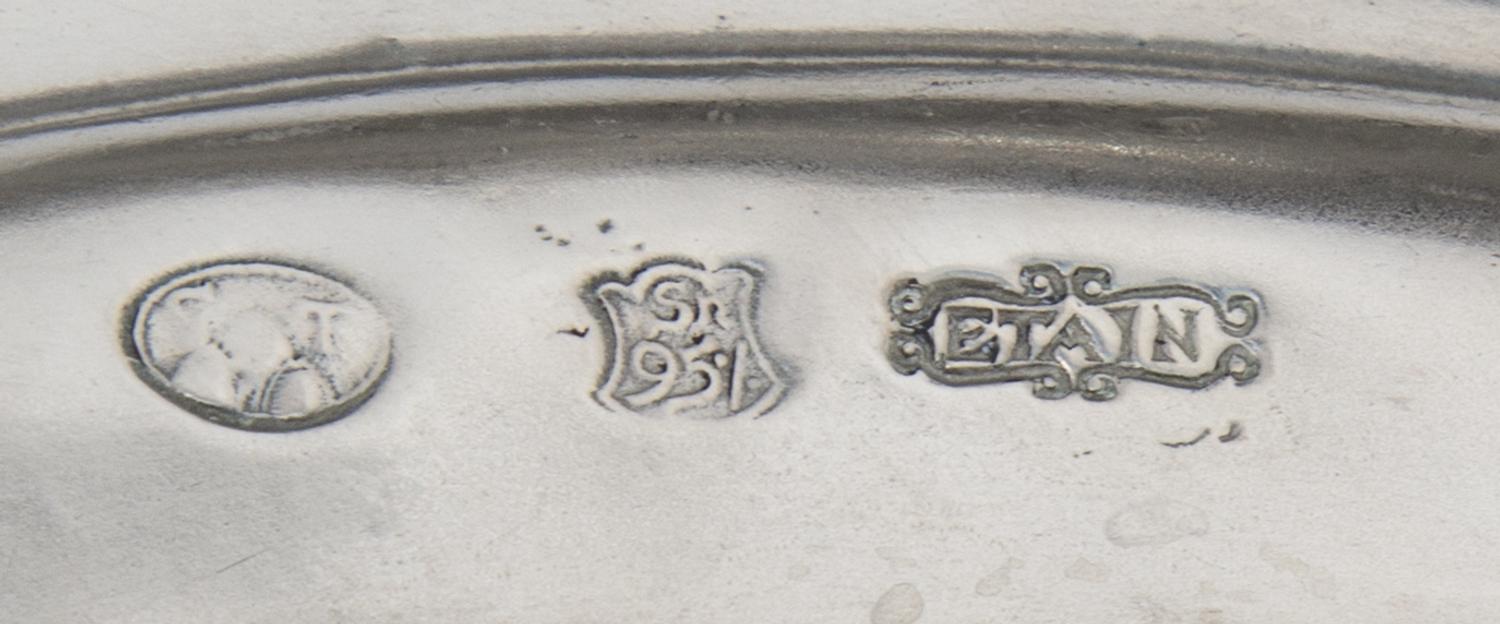 A Set of Twenty-Five Pewter Chargers Diameter 13 1/4 inches. — PIERRE DEUX