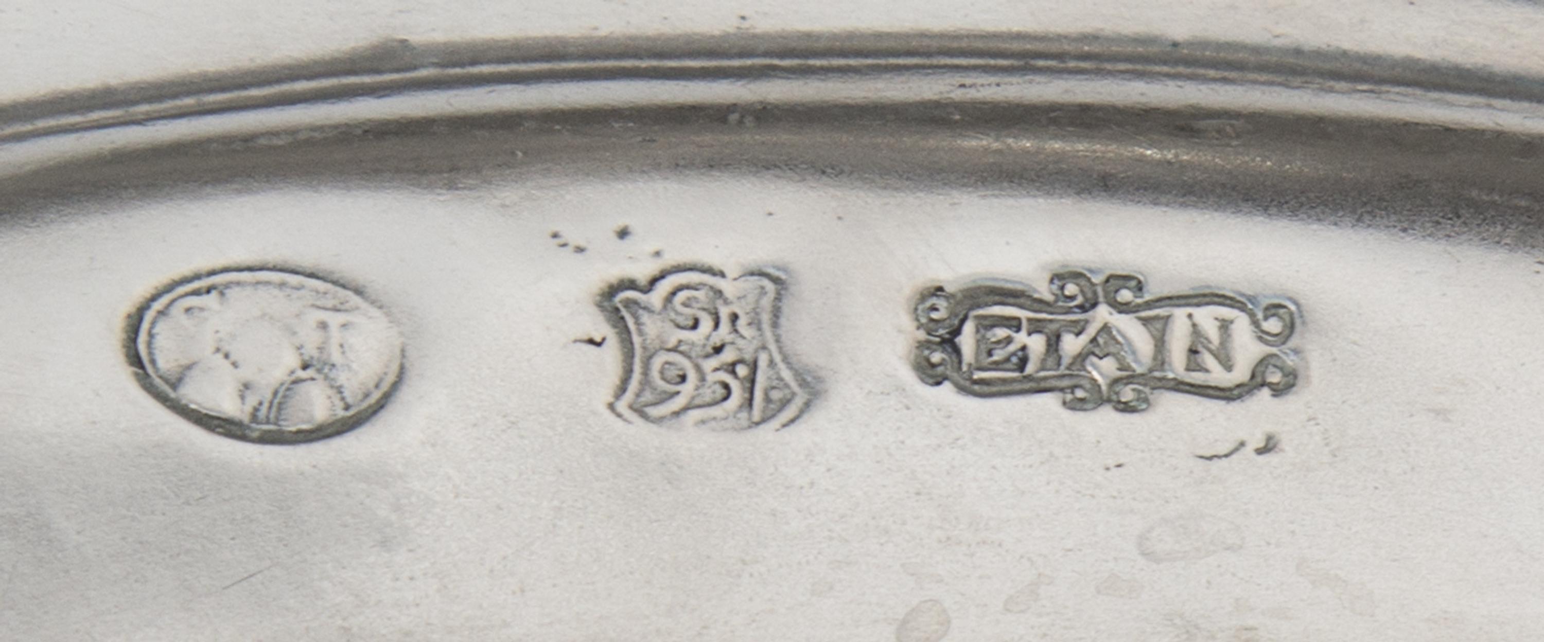 A Set of Twenty-Five Pewter Chargers Diameter 13 1/4 inches. — PIERRE DEUX