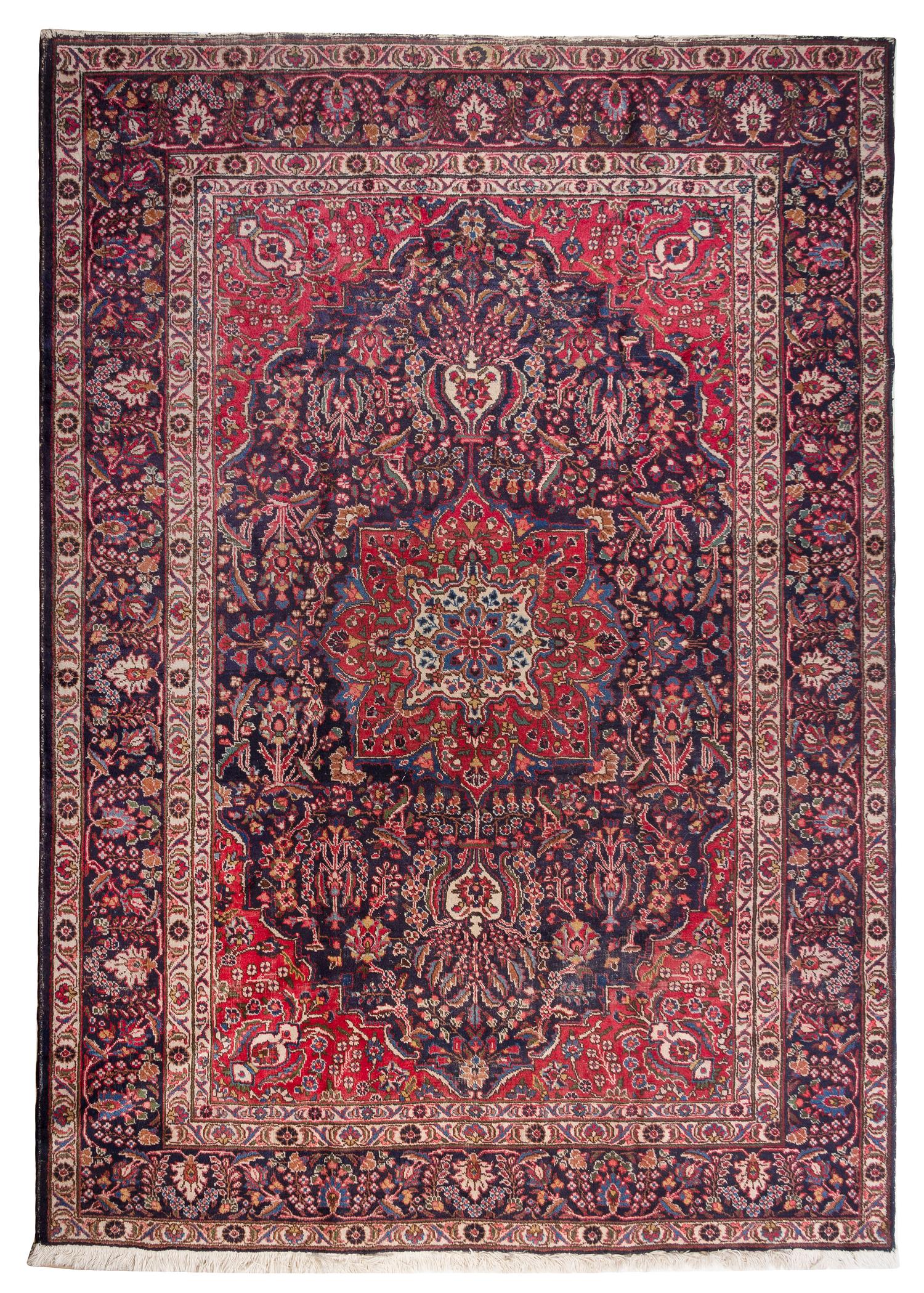 A Tabriz Wool Rug 9 feet 4 1/2 inches x 6 feet 8 1/4 inches.