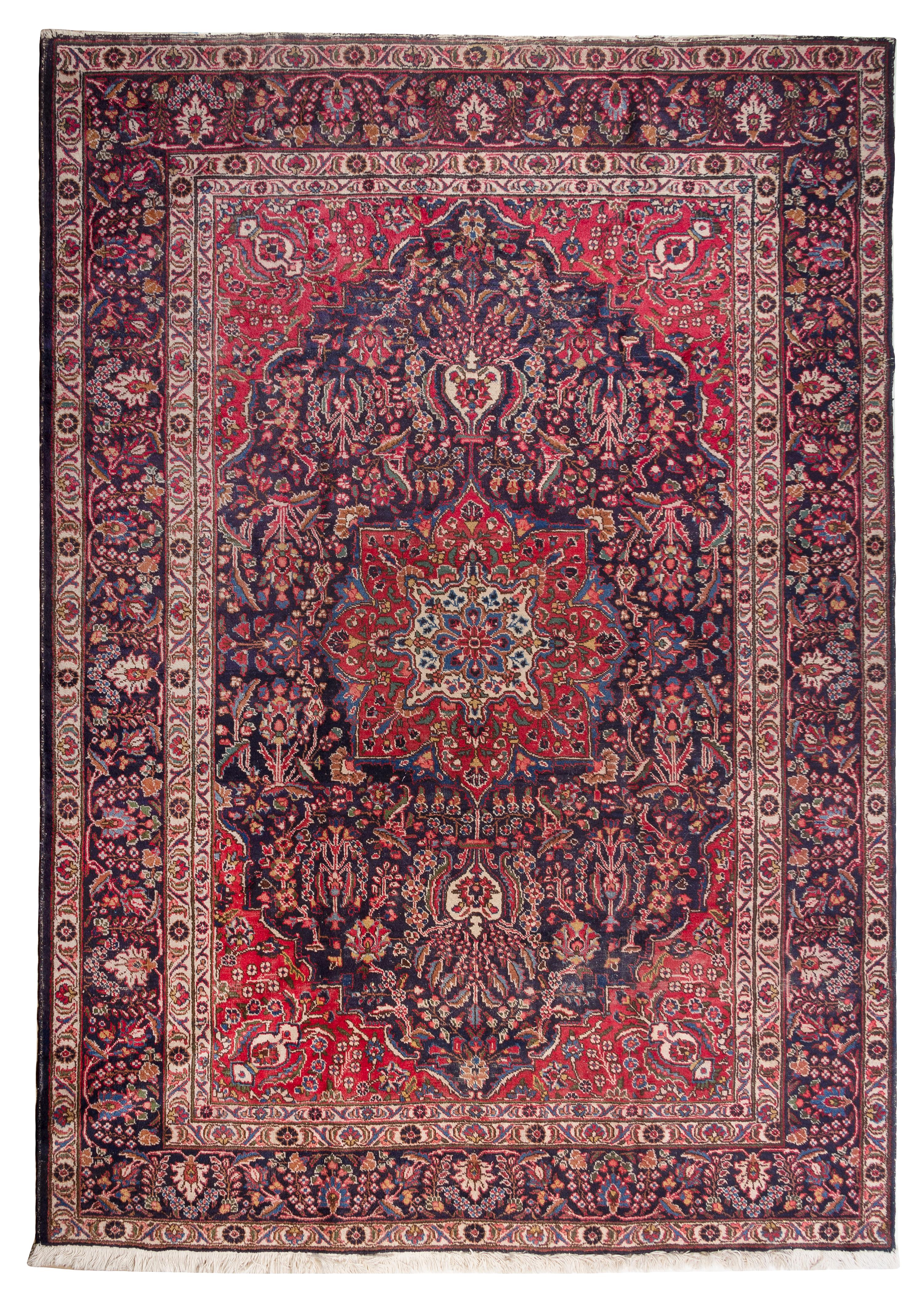 A Tabriz Wool Rug 9 feet 4 1/2 inches x 6 feet 8 1/4 inches.