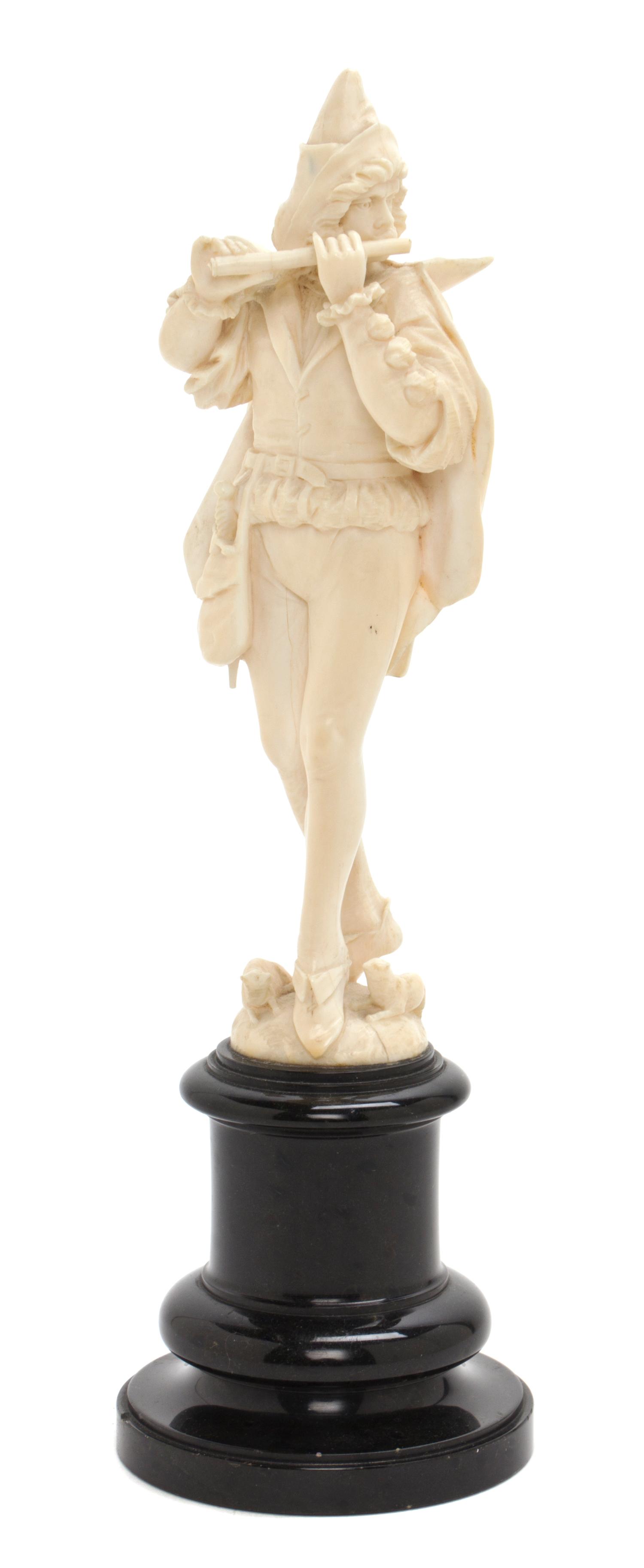 A Continental Carved Ivory Figure, Height overall 10 1/2 inches.