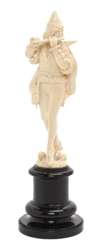 A Continental Carved Ivory Figure, Height overall 10 1/2 inches.