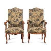 A Pair of Provincial Régence Walnut Armchairs