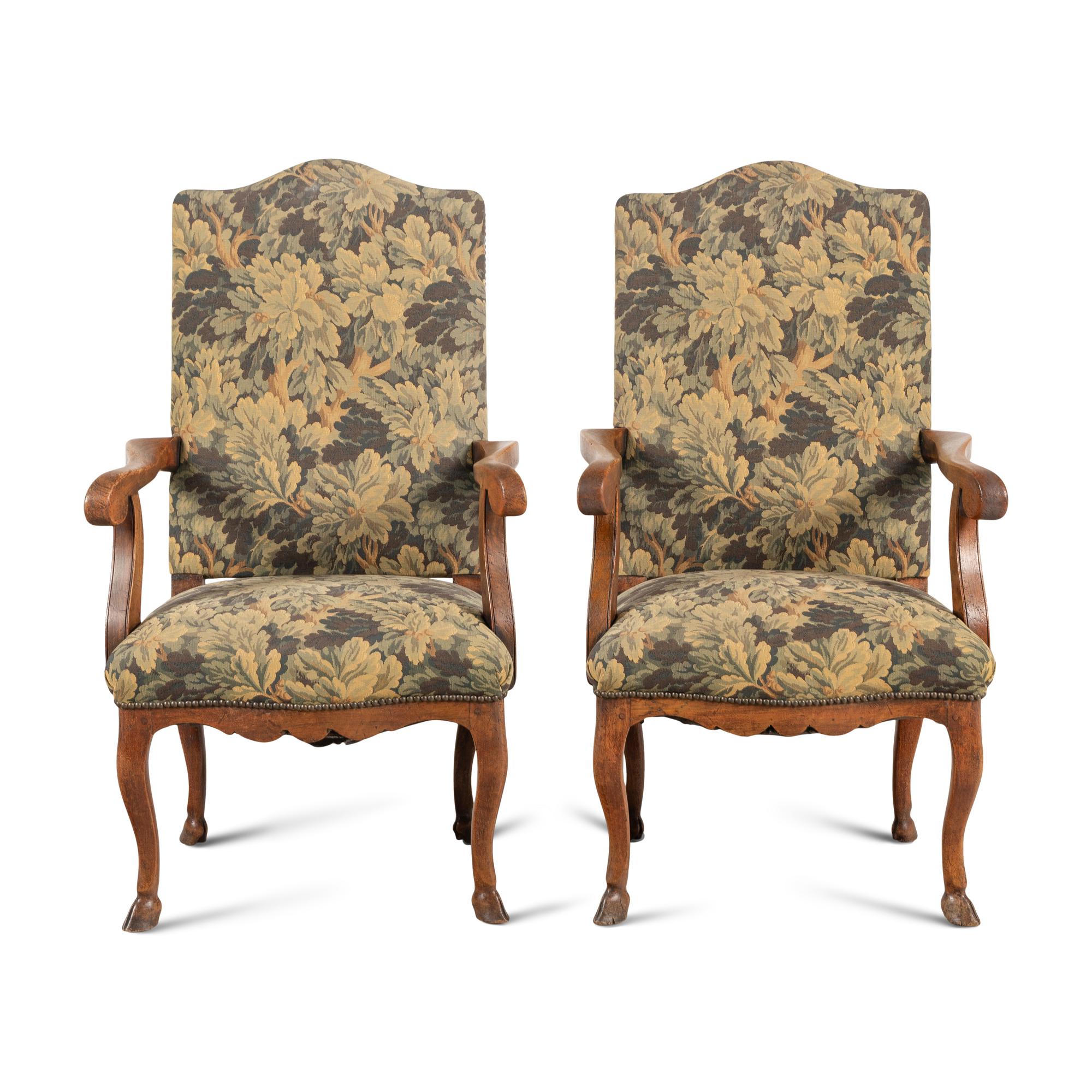 A Pair of Provincial Régence Walnut Armchairs