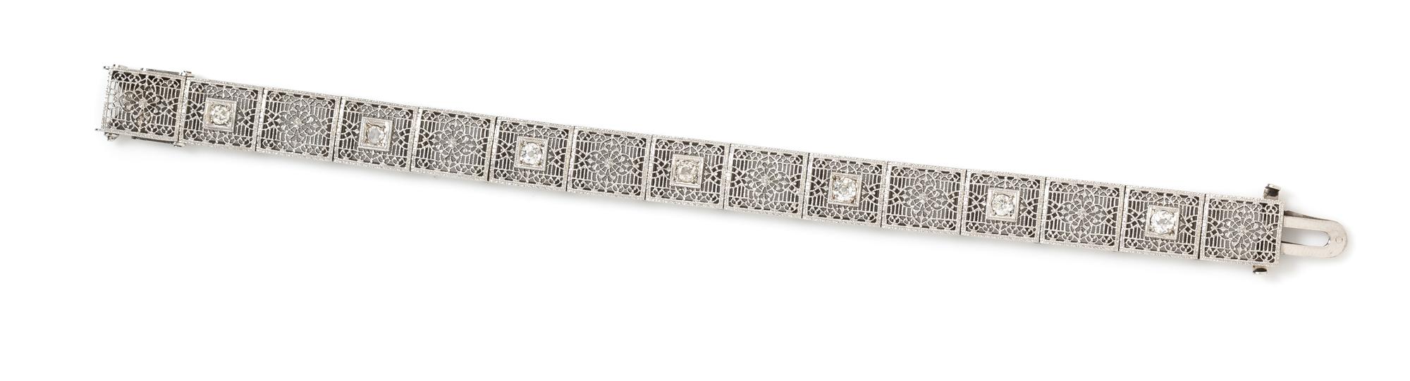 An Art Deco Platinum Topped 14 Karat White Gold and Diamond Bracelet, 11.20 dwts.