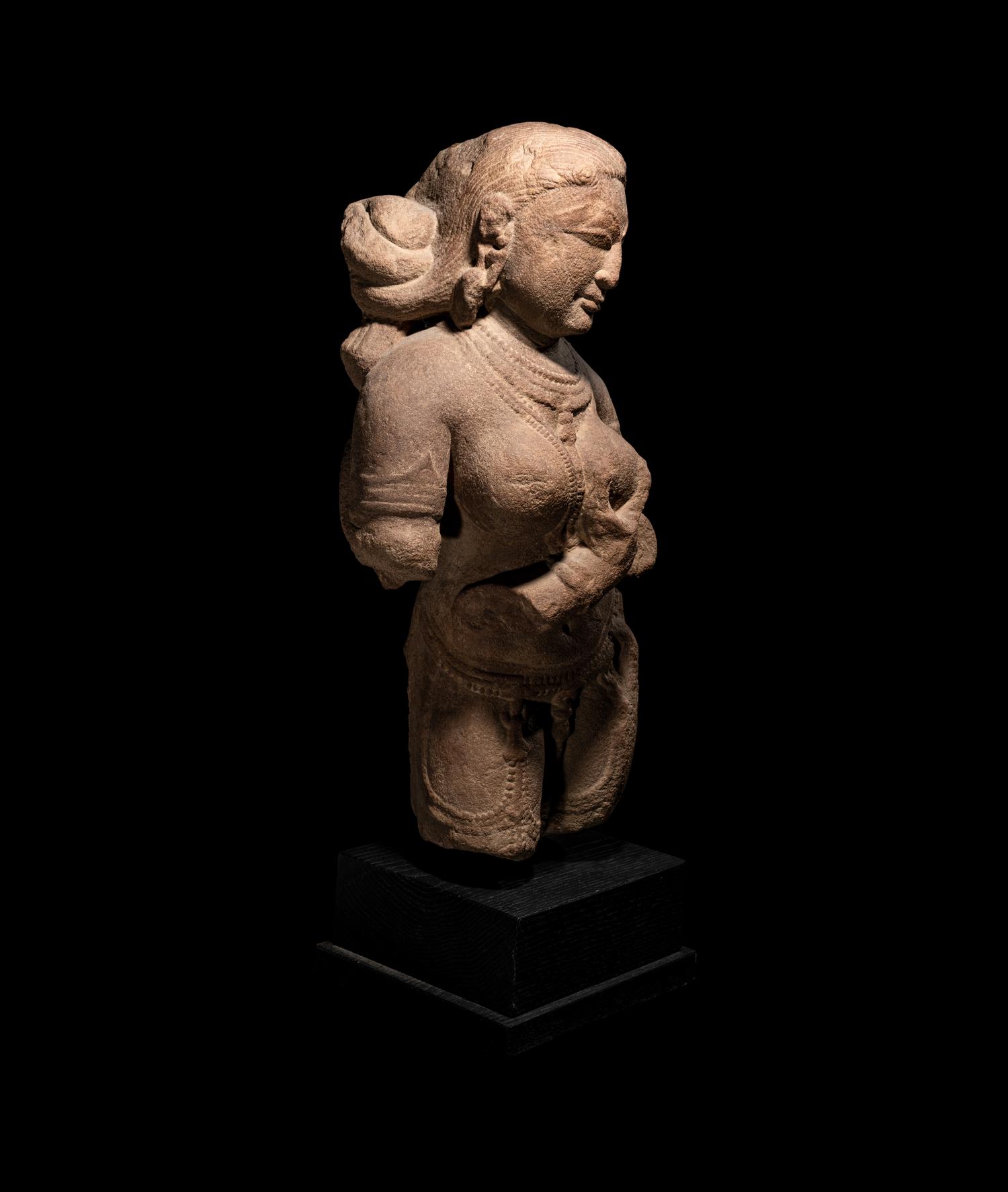 An Indian Red Sandstone Figure of a Female Deity