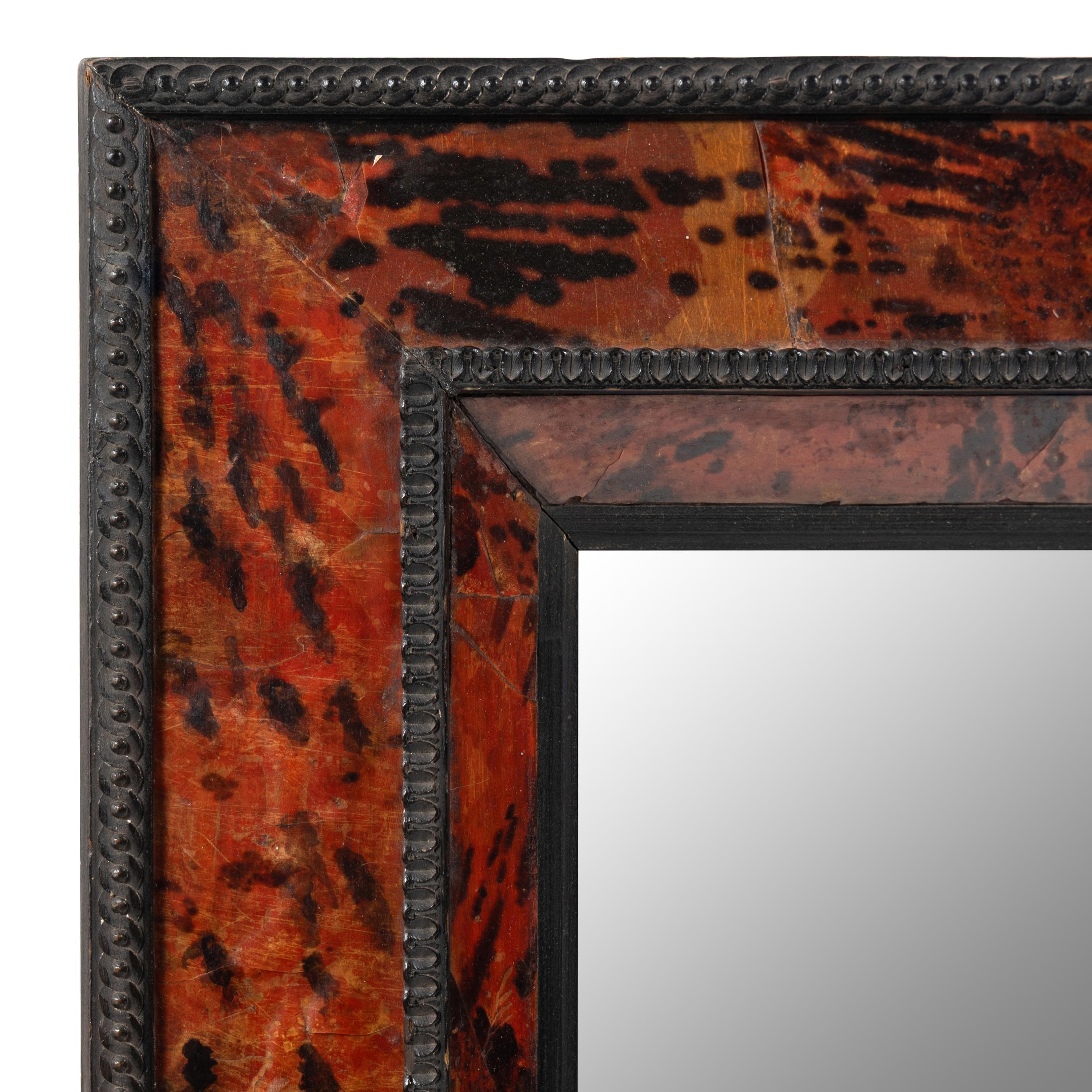 A Flemish Tortoise Shell and Part Ebonized Mirror