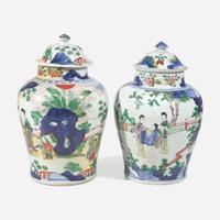 Two Chinese wucai-decorated porcelain jars and associated covers 五彩瓷罐两件 17th century ????