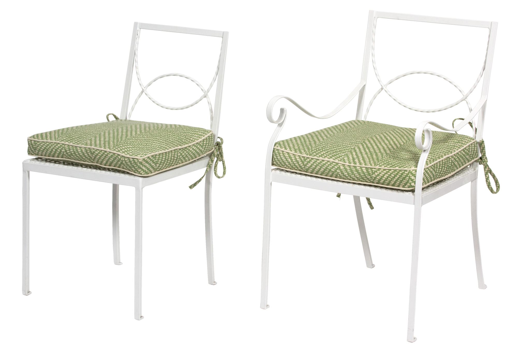 A Group of White Painted Iron Garden Furniture Dining table height 29 x length 60 x width 32 inches. — 20TH CENTURY