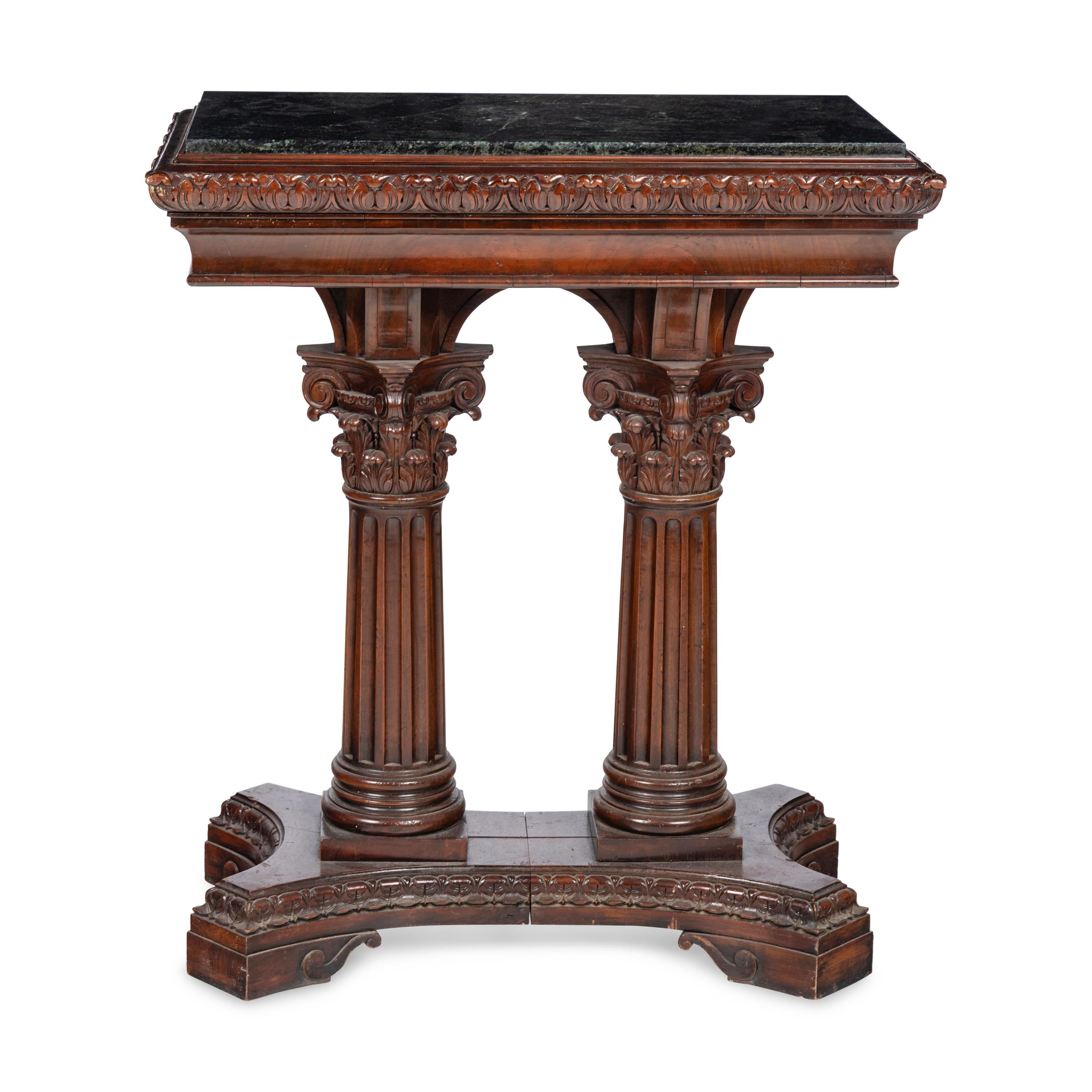A Renaissance Style Walnut and Marble Pedestal Table