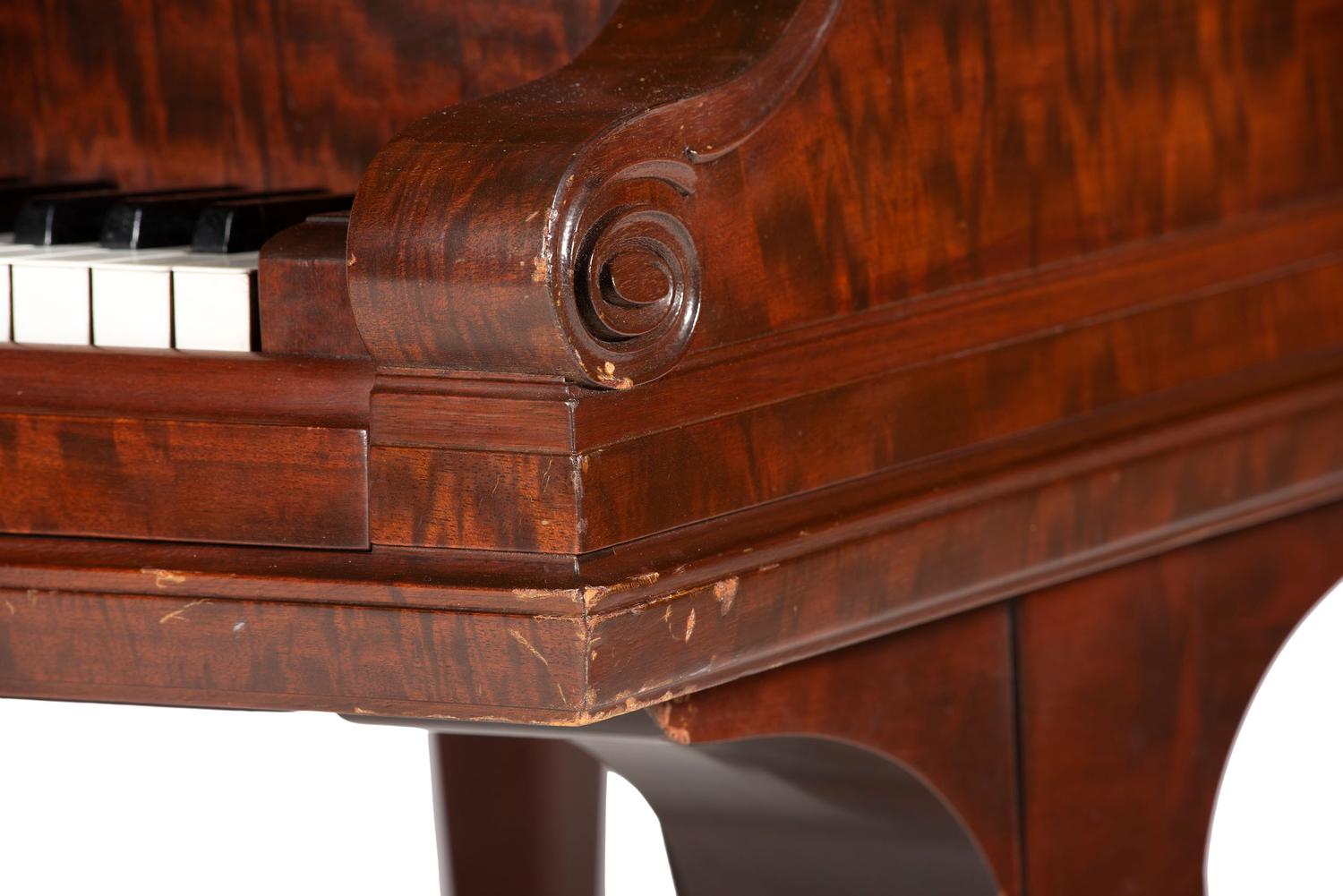 A Steinway and Sons Mahogany Baby Grand Piano