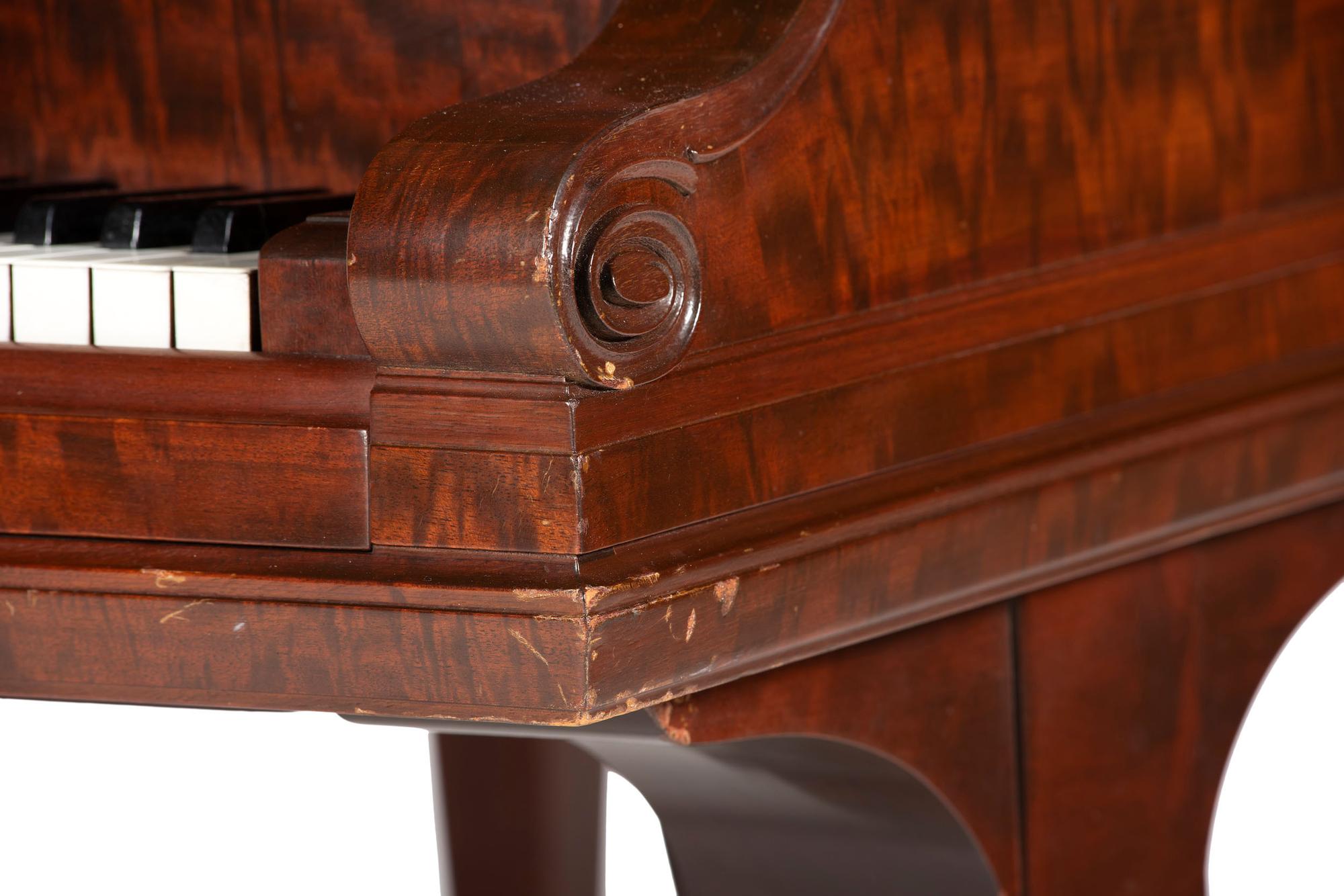 A Steinway and Sons Mahogany Baby Grand Piano