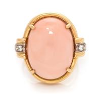 An 18 Karat Bicolor Gold, Angel Skin Coral and Diamond Ring, 7.80 dwts.