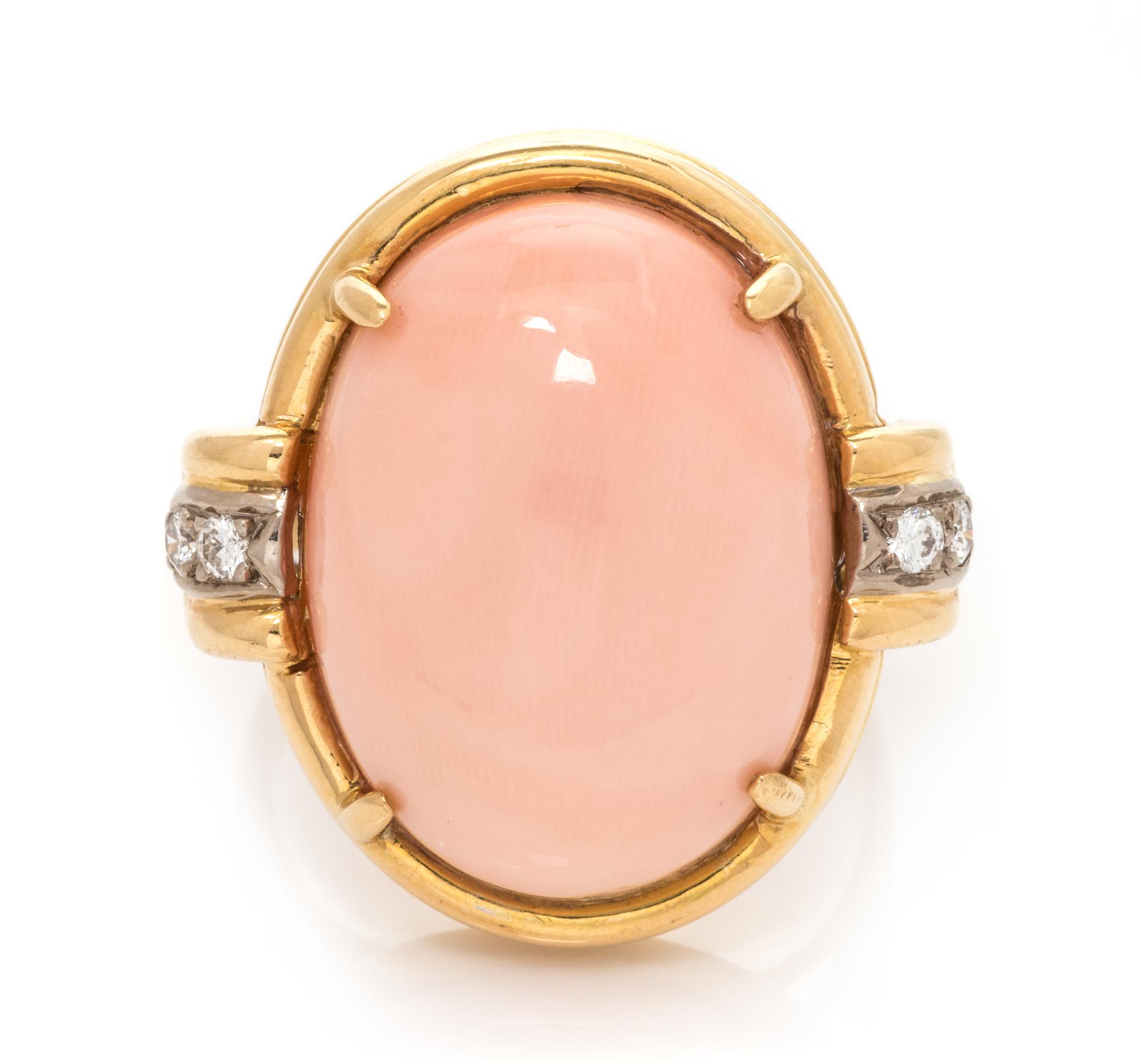 An 18 Karat Bicolor Gold, Angel Skin Coral and Diamond Ring, 7.80 dwts.