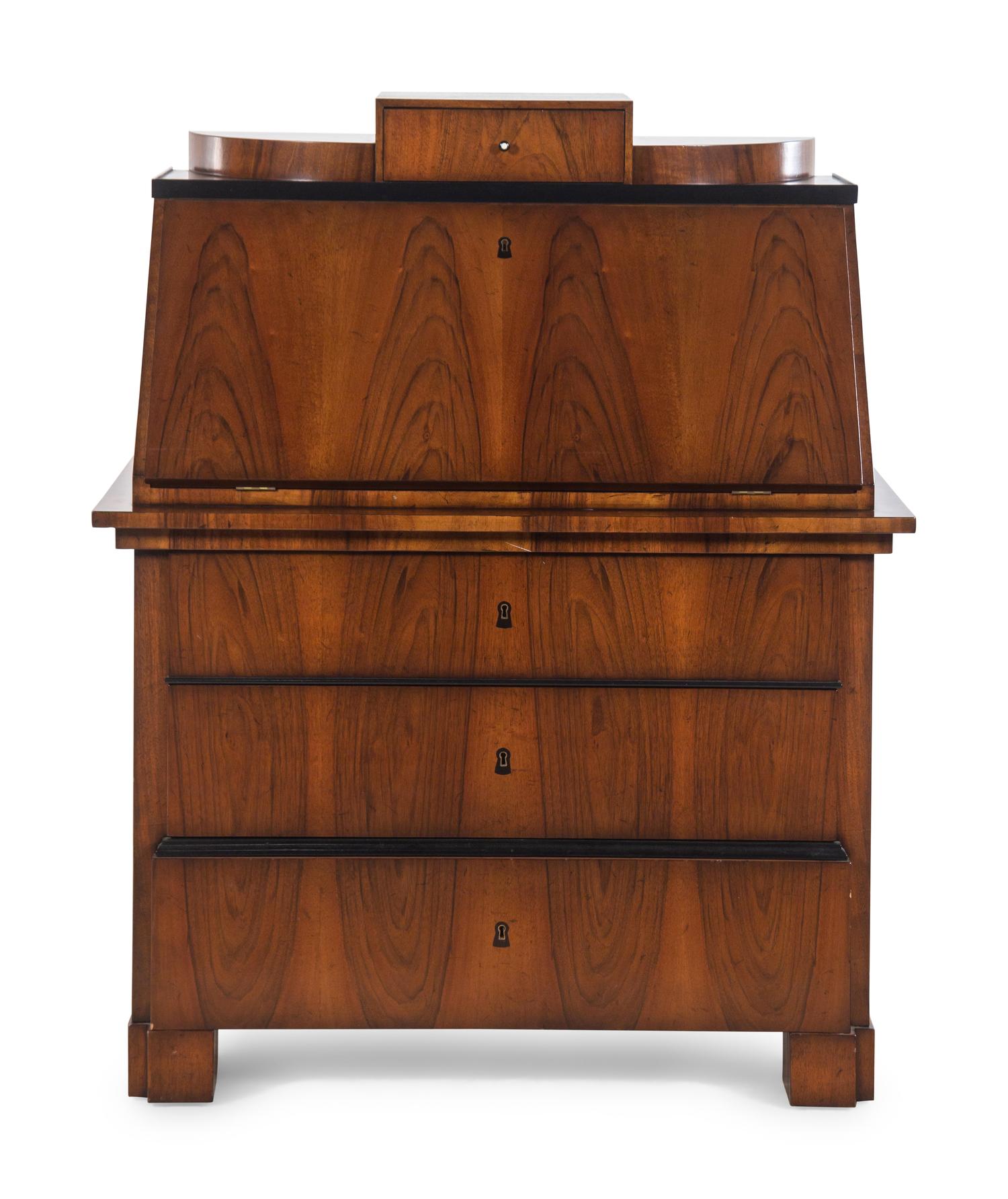 A Biedermeier Parcel Ebonized Birch Slant-Front Secretary