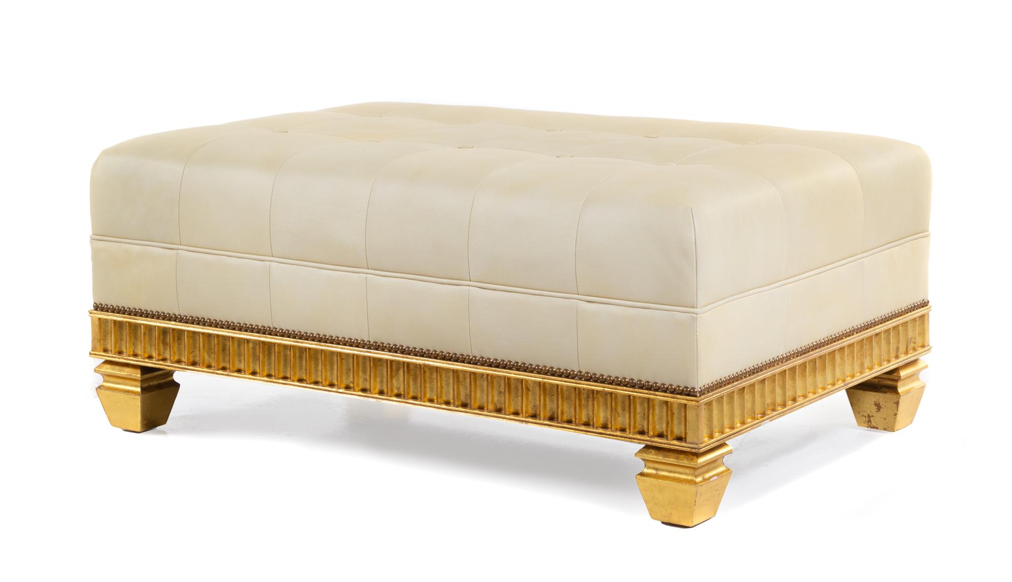 A Continental Style Leather Upholstered Giltwood Ottoman Height 18 1/4 x width 43 1/8 x depth 29 inches. — 20TH CENTURY