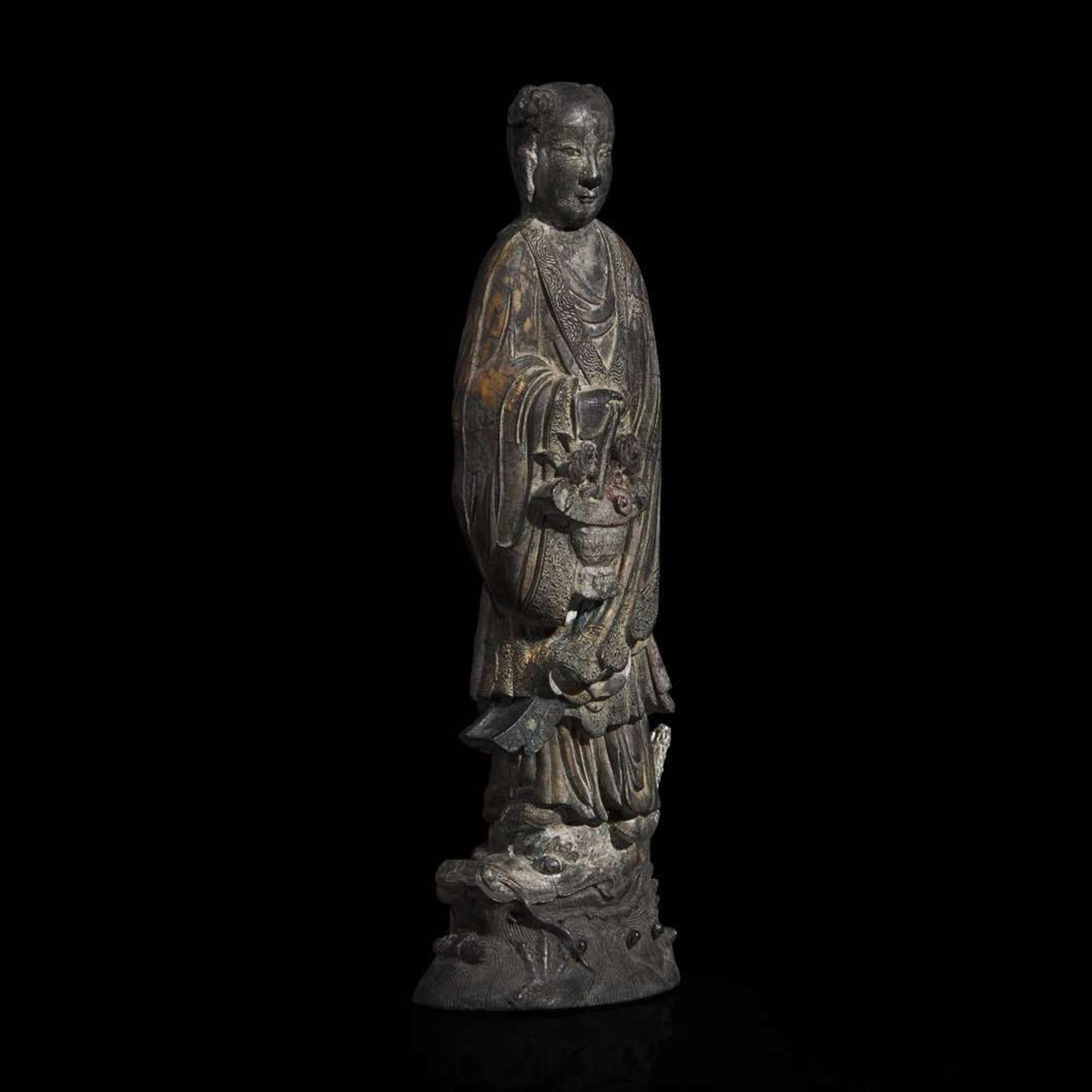 A Chinese parcel-gilt "Lan Caihe" ink cake 漆金仙人造形墨饼一件 "Hu ziqing" mark ??????; Qing dynasty, 19th century ? ????