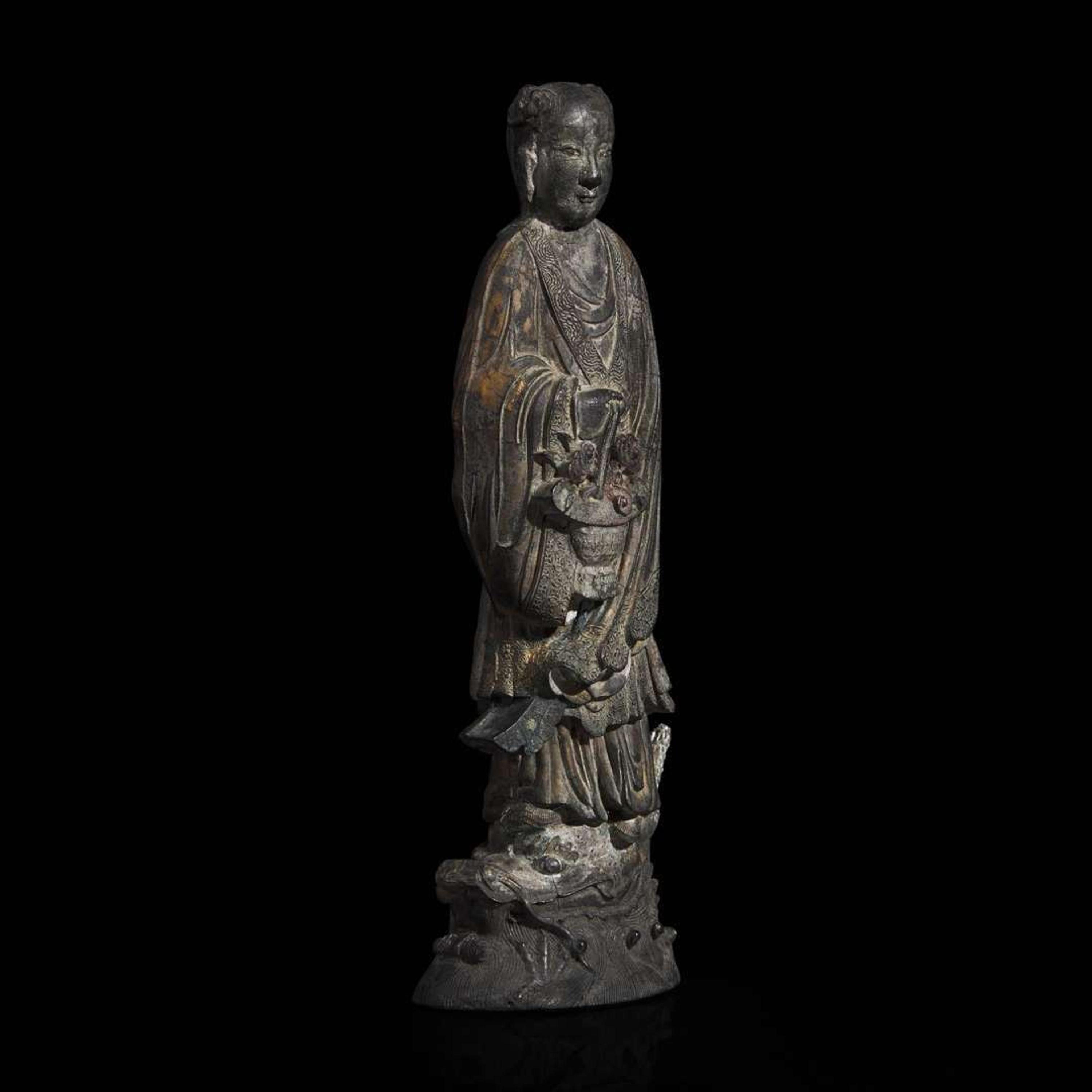 A Chinese parcel-gilt "Lan Caihe" ink cake 漆金仙人造形墨饼一件 "Hu ziqing" mark ??????; Qing dynasty, 19th century ? ????
