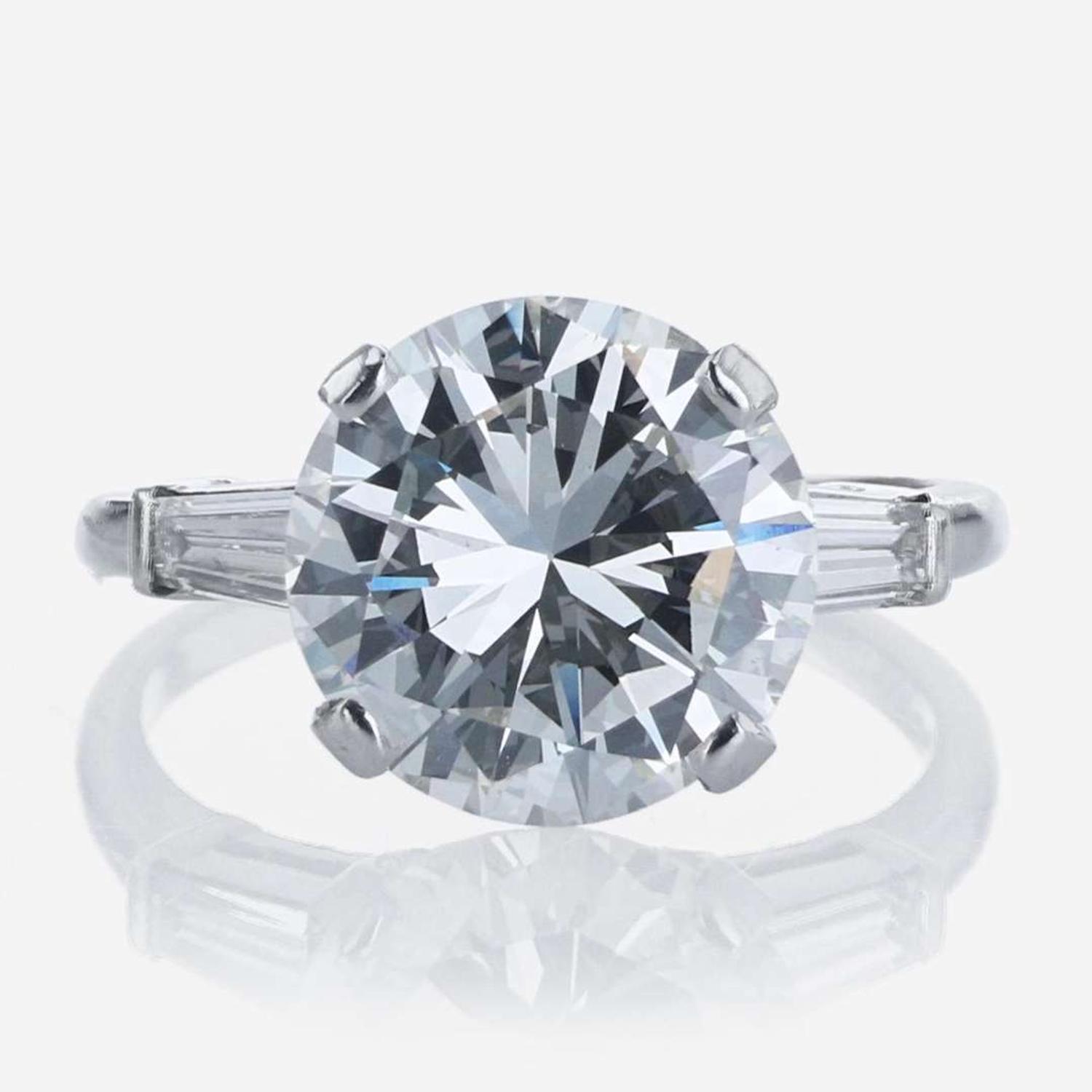 A Ladies Diamond and Platinum Ring 5.44 Carat Round Brilliant Diamond, GIA Certified