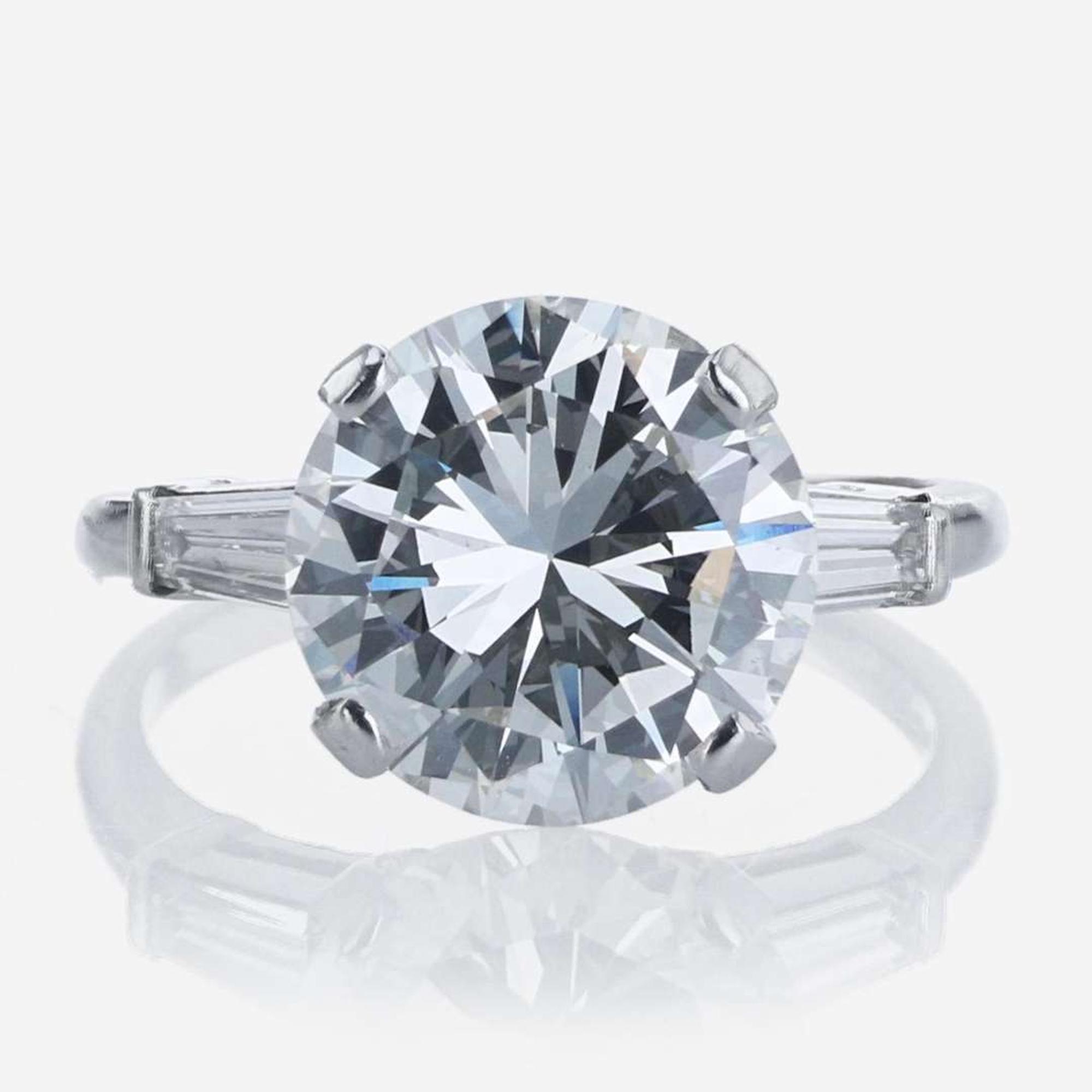 A Ladies Diamond and Platinum Ring 5.44 Carat Round Brilliant Diamond, GIA Certified