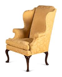 A George I Walnut Wingback Armchair