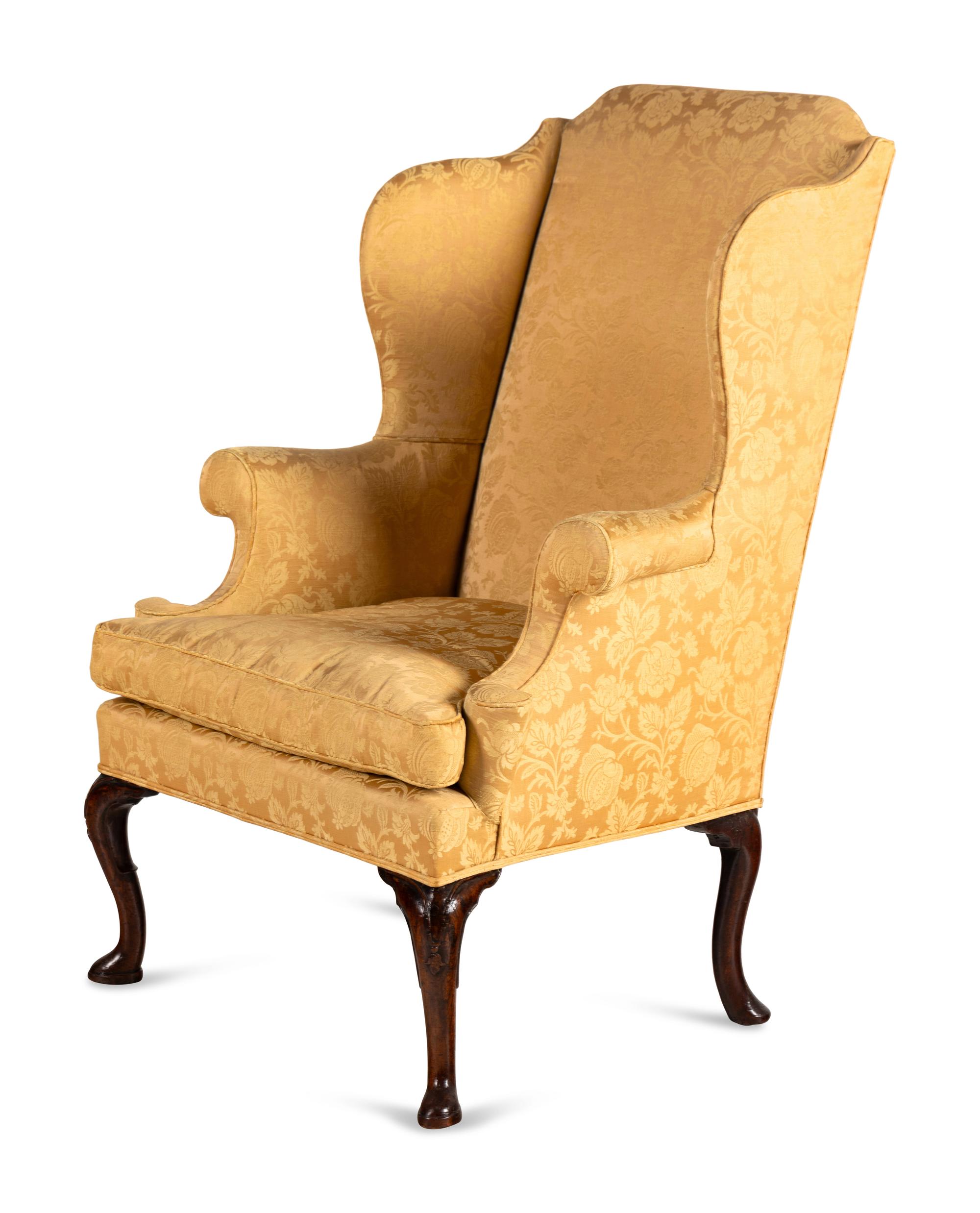 A George I Walnut Wingback Armchair