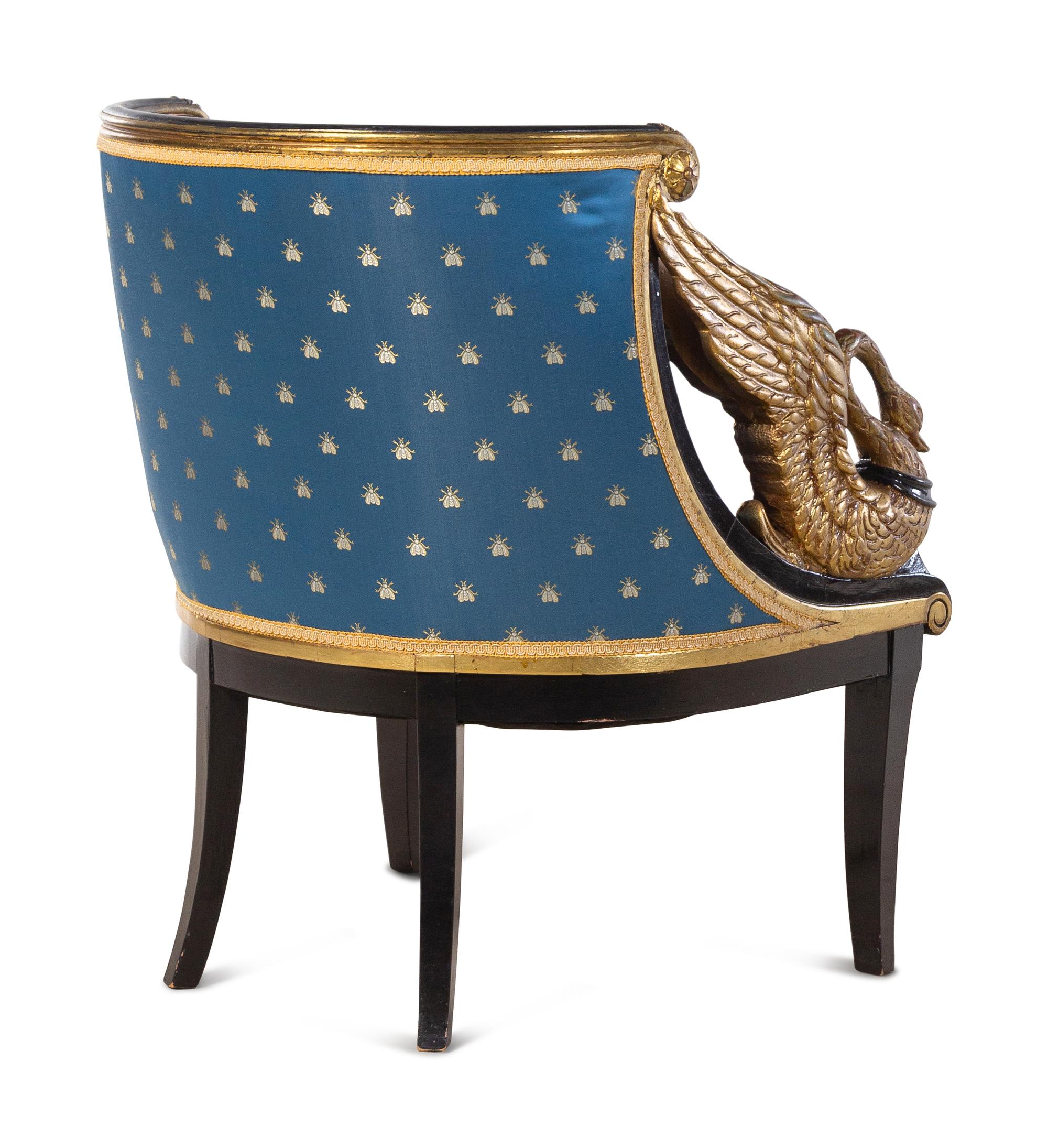 Two Empire Style Parcel Gilt Ebonized Armchairs