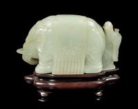 A Celadon Jade Figural Group of an Elephant and an Immortal Length 5 3/4 inches. — QIANLONG PERIOD (1735-1796)