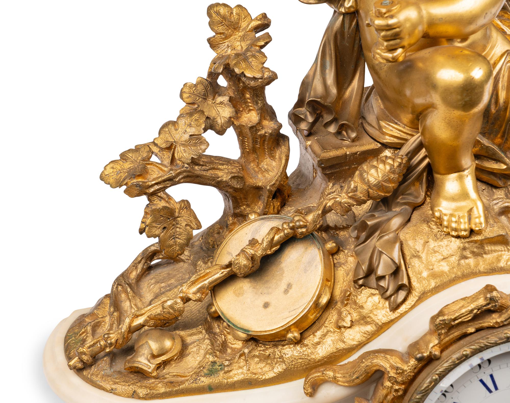 An Assembled French Gilt Bronze Mounted Marble Three-Piece Clock Garniture