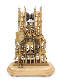 A Victorian Brass Cathedral-Form Skeleton Clock