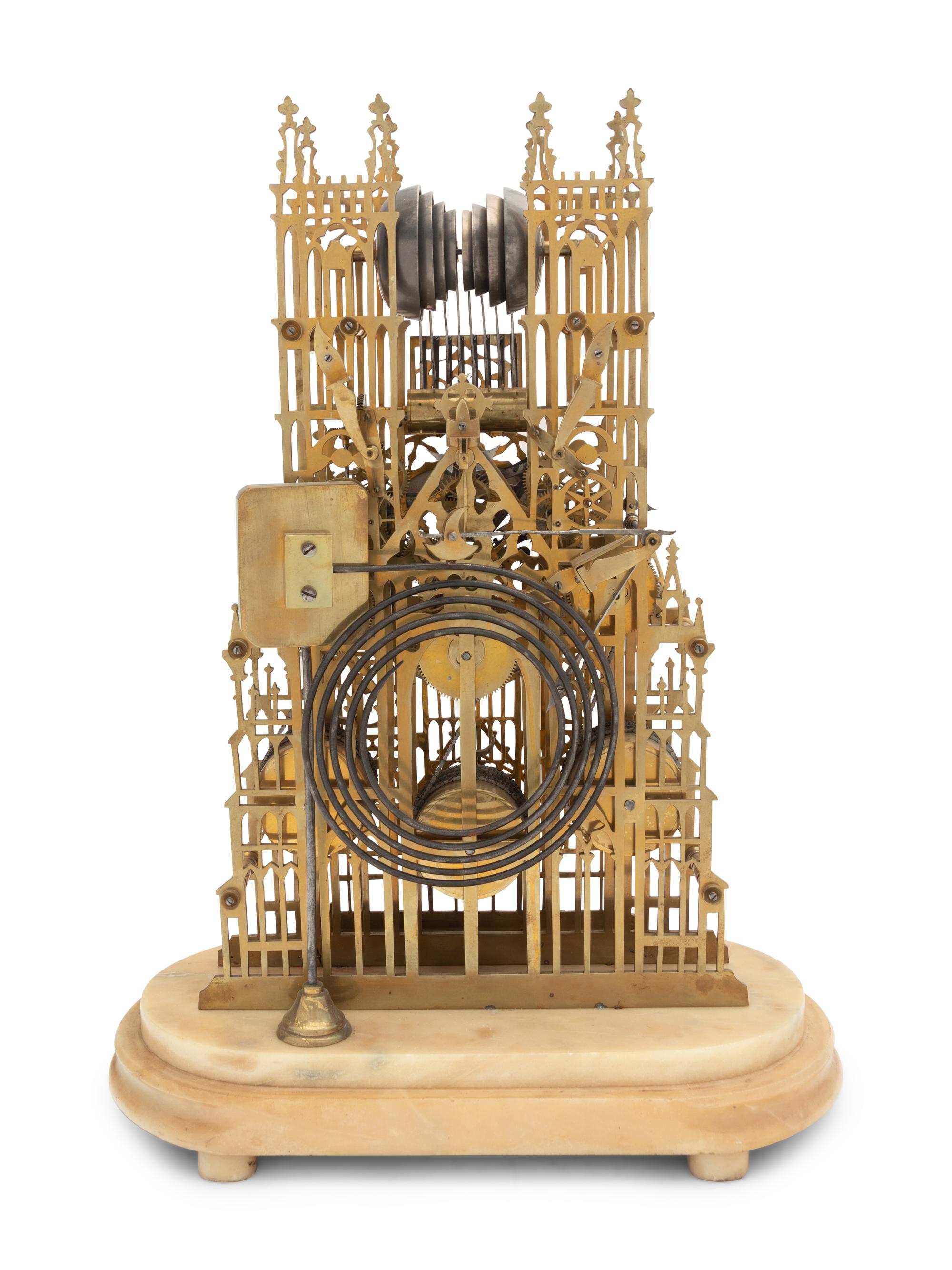 A Victorian Brass Cathedral-Form Skeleton Clock