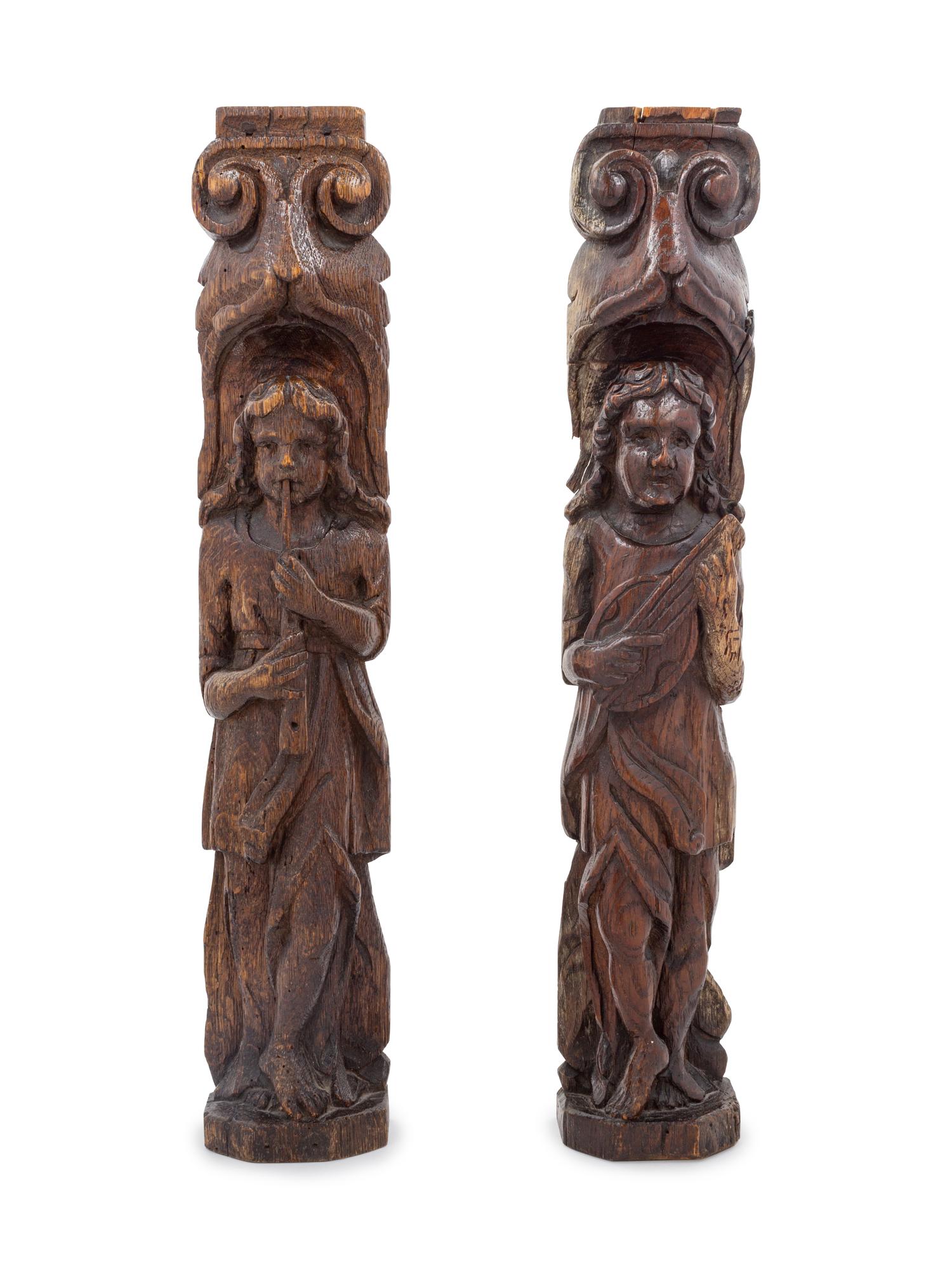 A Pair of Carved Wood Figureheads
