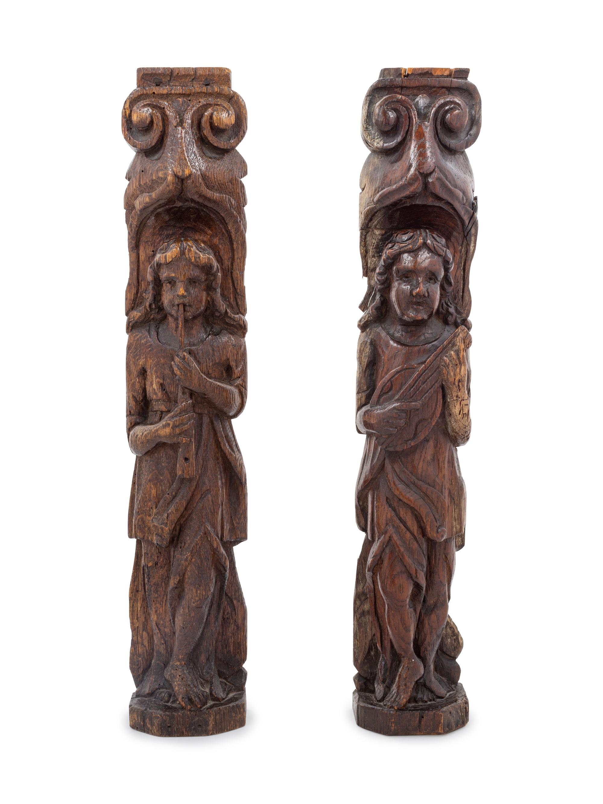 A Pair of Carved Wood Figureheads