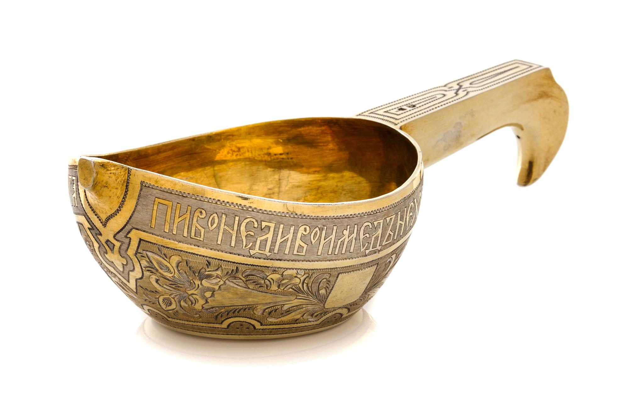 A Russian Silver-Gilt Kovsh, Mark of Andrei Vekman, assay mark of V. Savinsky, Moscow, 1875, the body decorated with a Cyrillic inscrip