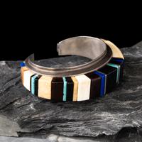 Charles Loloma (Hopi, 1921-1991) — Silver and Cobblestone Inlay Cuff Bracelet