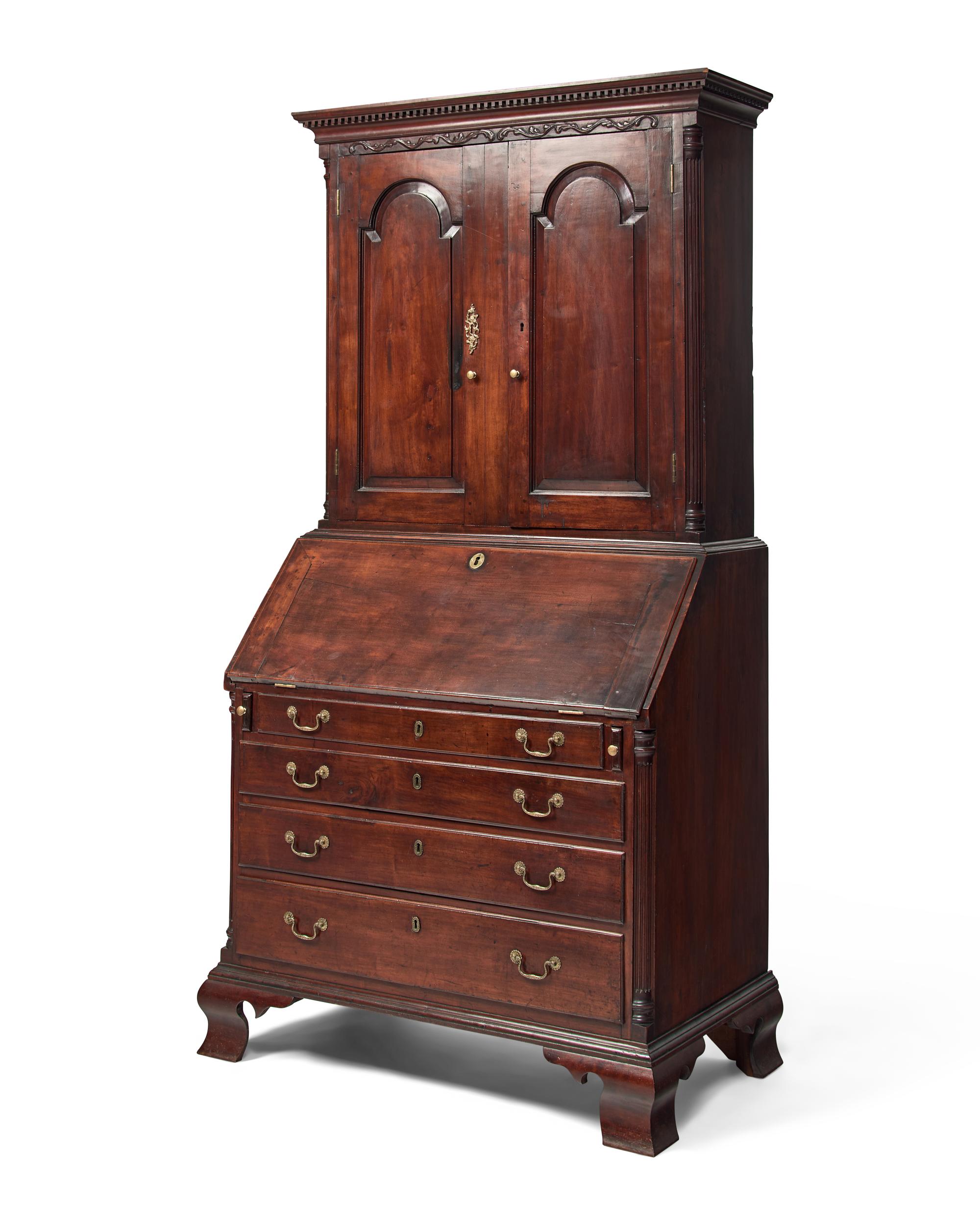 A Chippendale Carved Cherrywood Desk and Bookcase