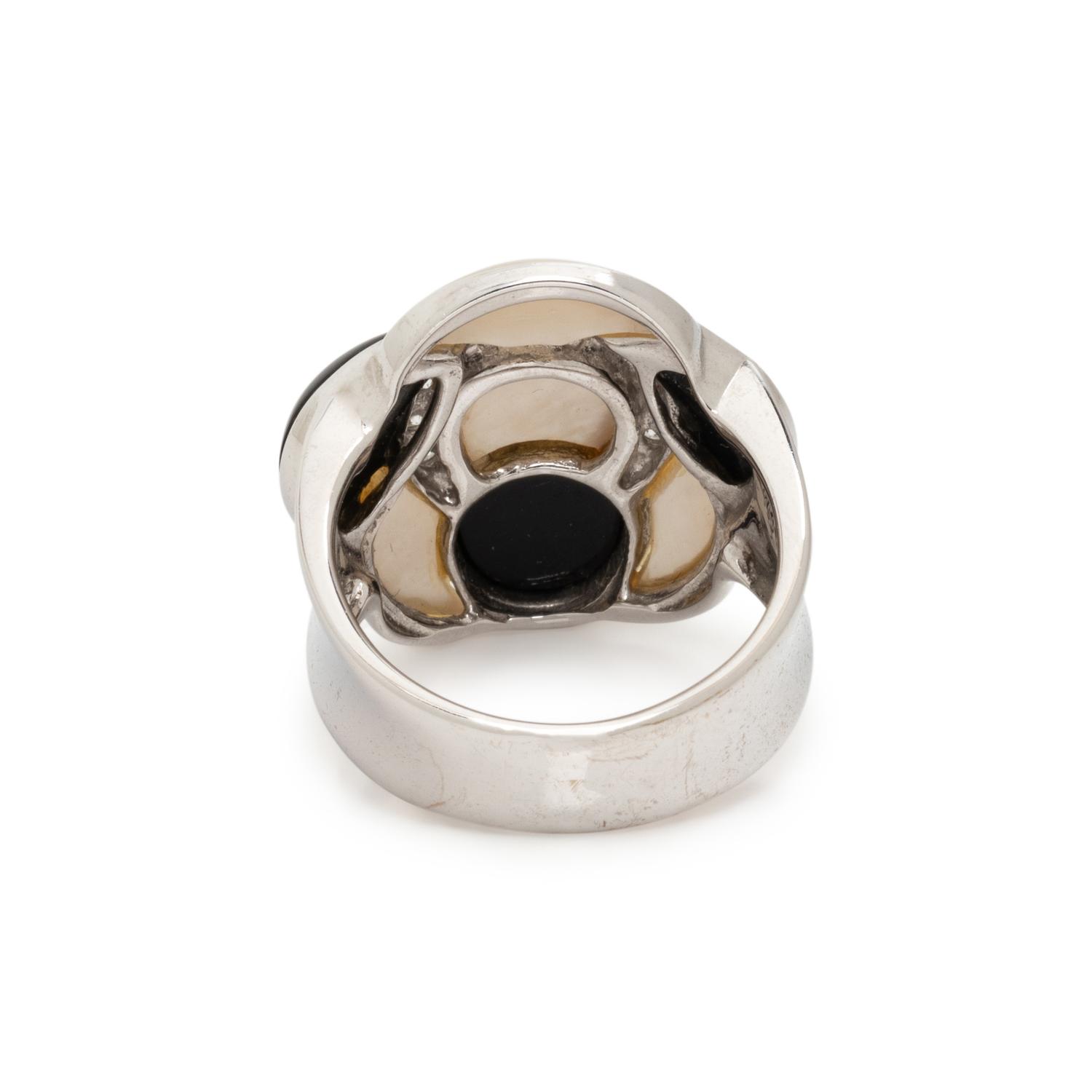 MOTHER-OF-PEARL, ONYX AND DIAMOND RING