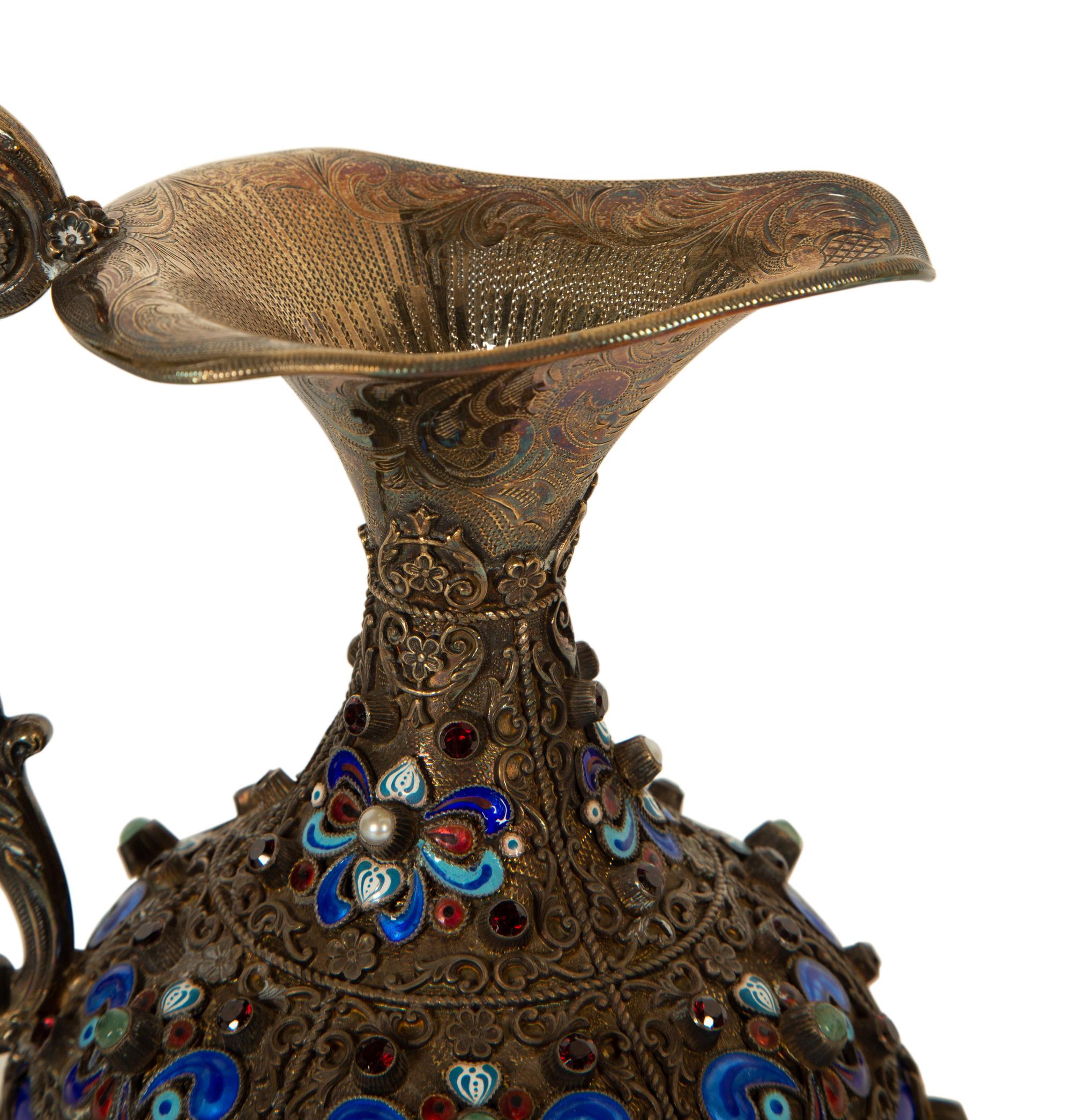 A Continental Enameled and Gem-Encrusted Silver-Gilt Wine Ewer