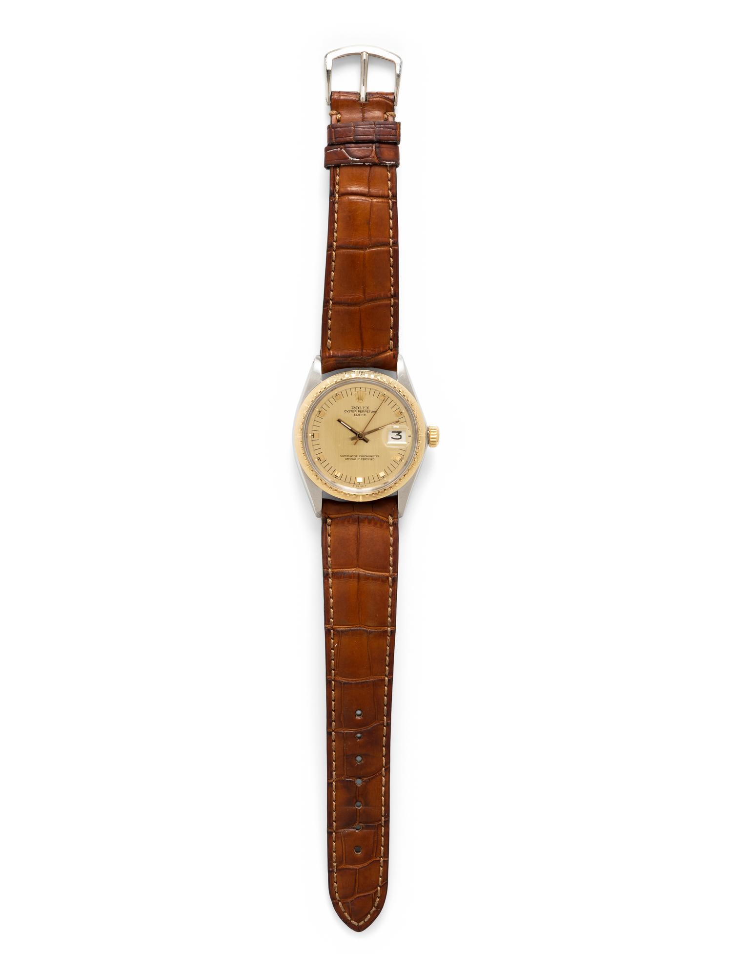 ROLEX, REF. 1512 STAINLESS STEEL AND 18K ENGINE TURNED YELLOW GOLD BEZEL 'DATE' 'ZEPHYR' WATCH, CIRCA 1970